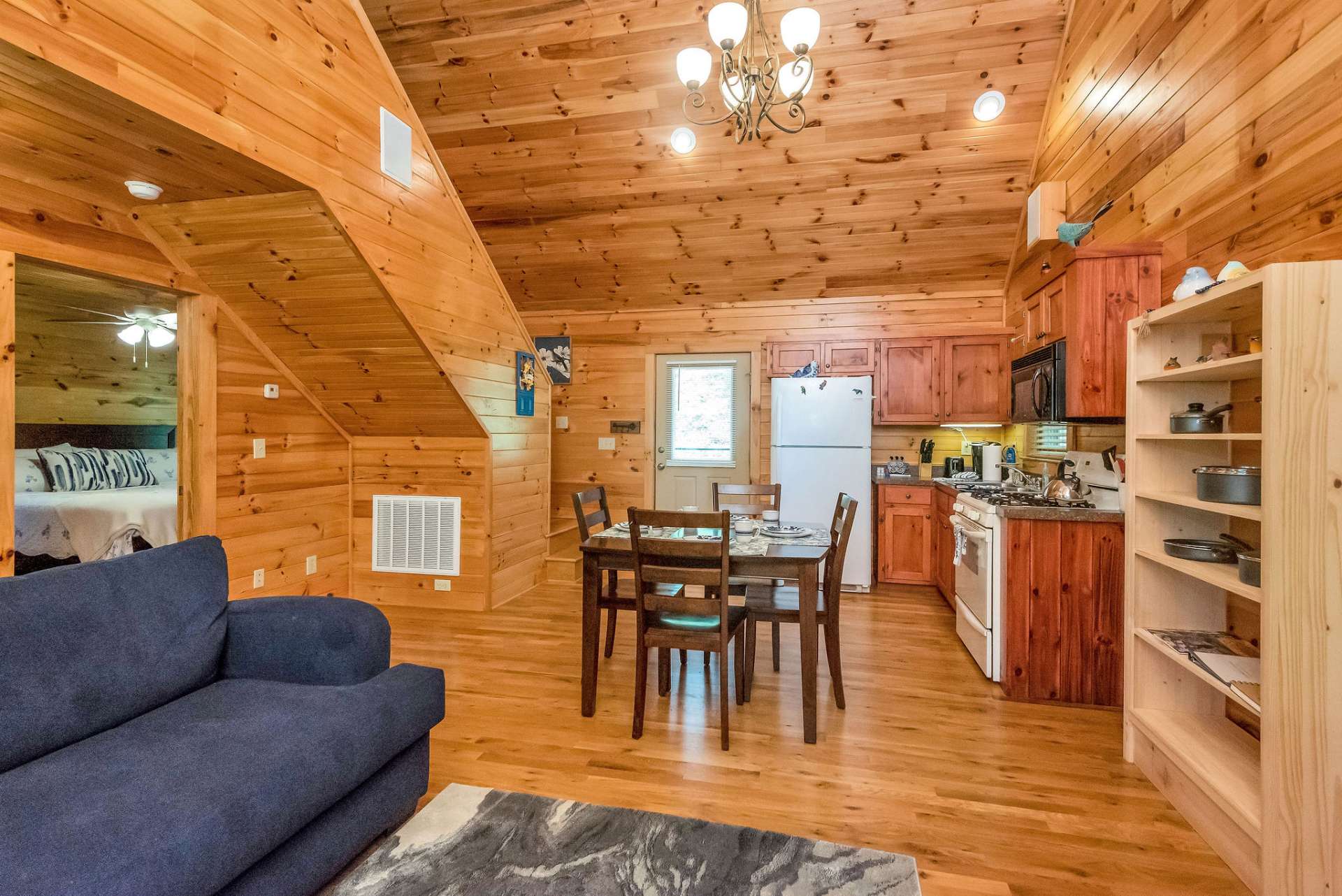 Walk into the great room featuring the kitchen, dining, and living room.