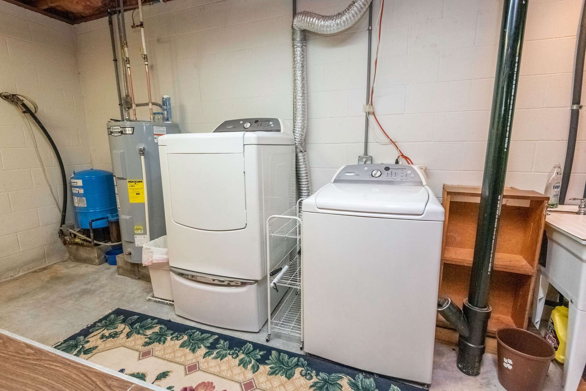 Lower level laundry area.