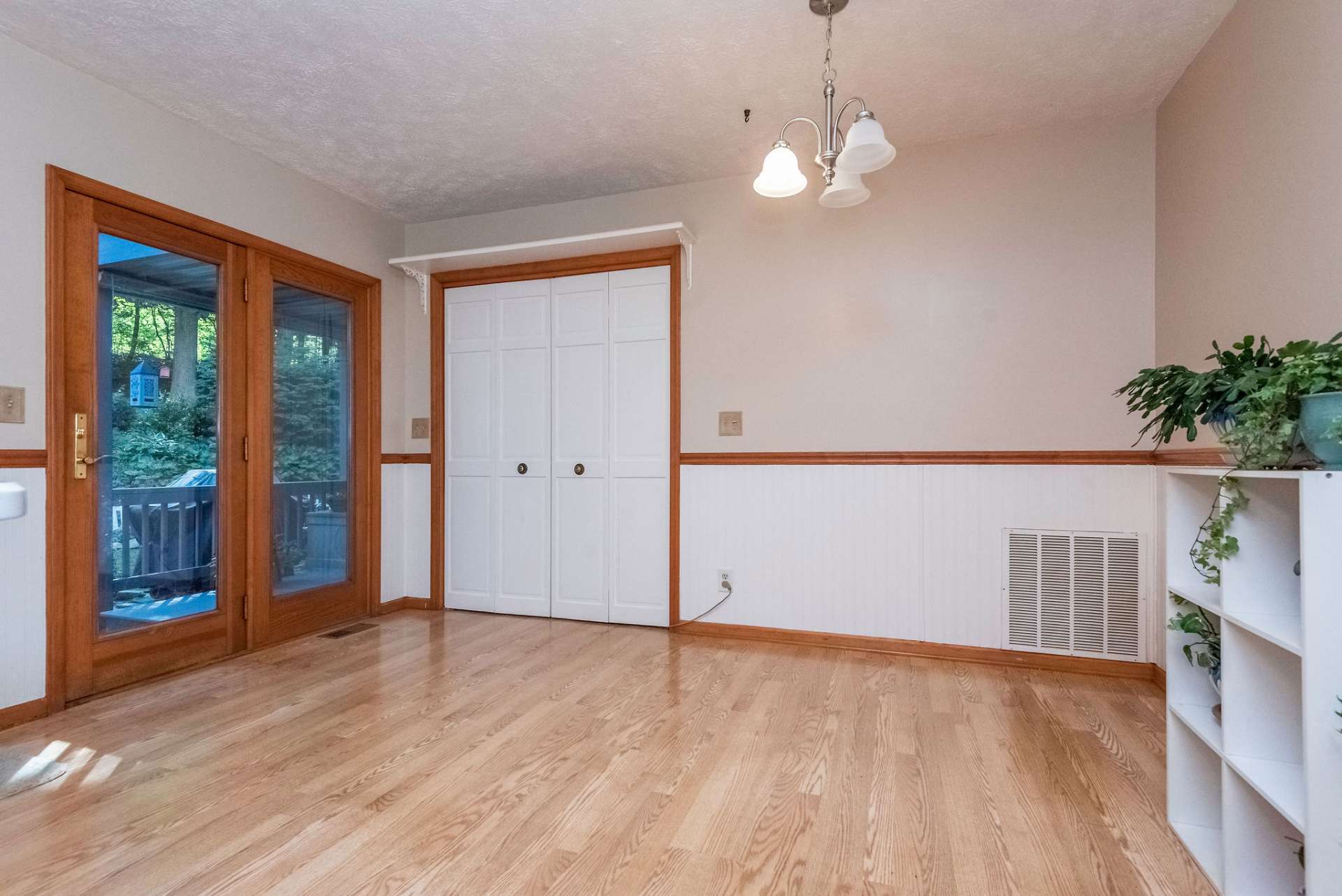 The dining area has a closet most recently used as a pantry. It's equipped with a washer and dryer hook up and vent for main level laundry.