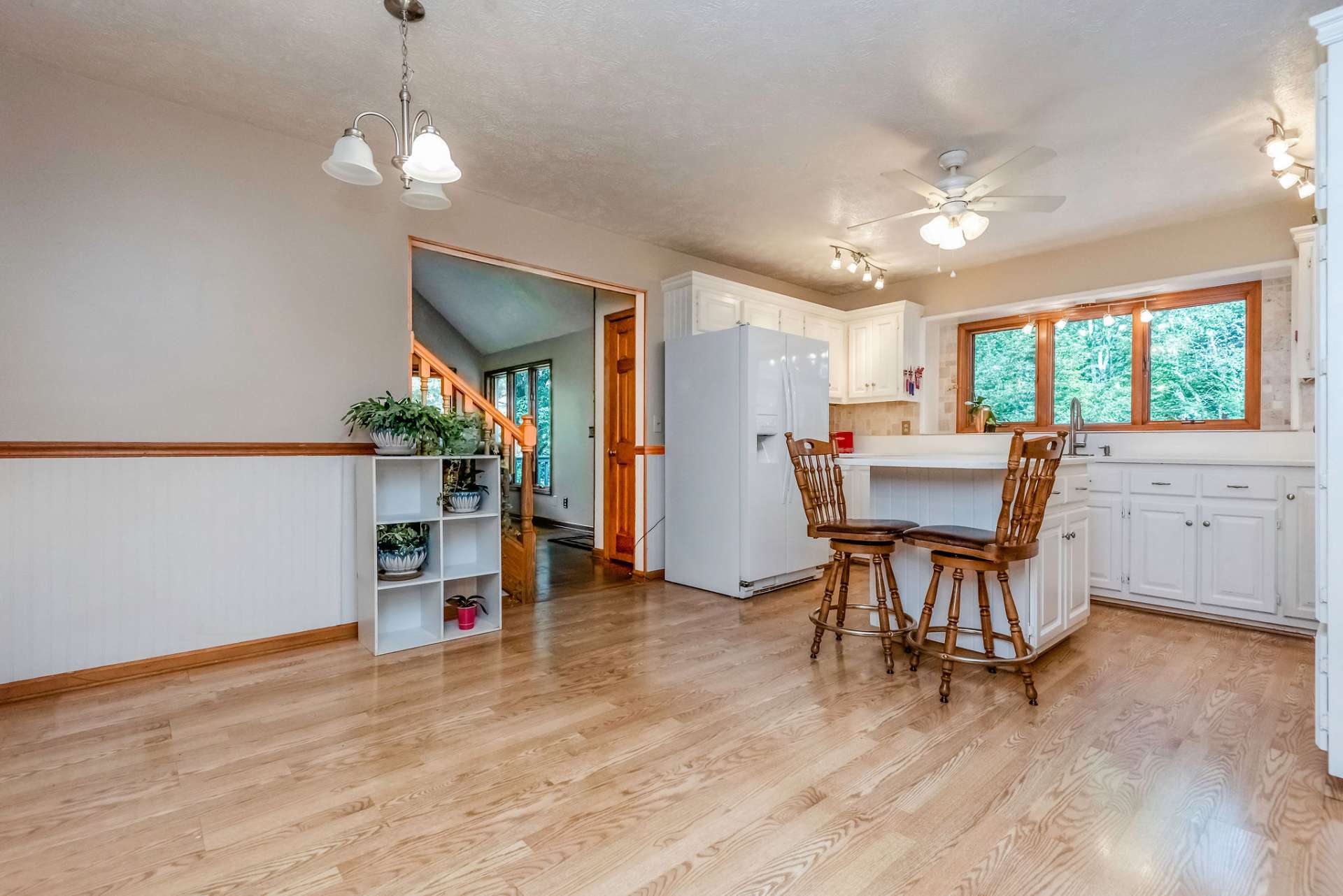 Island offers bar seating with extra counter space and storage.