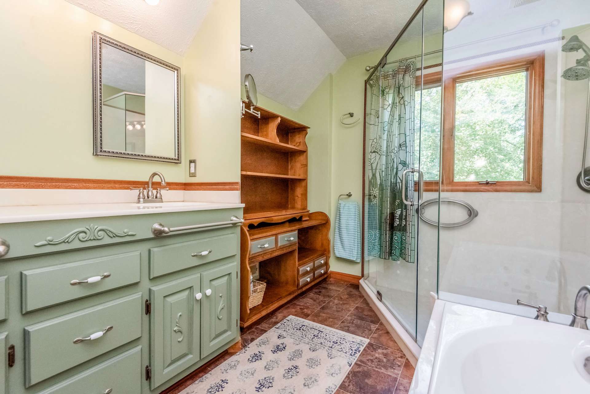 Master full bath with additional attic storage.