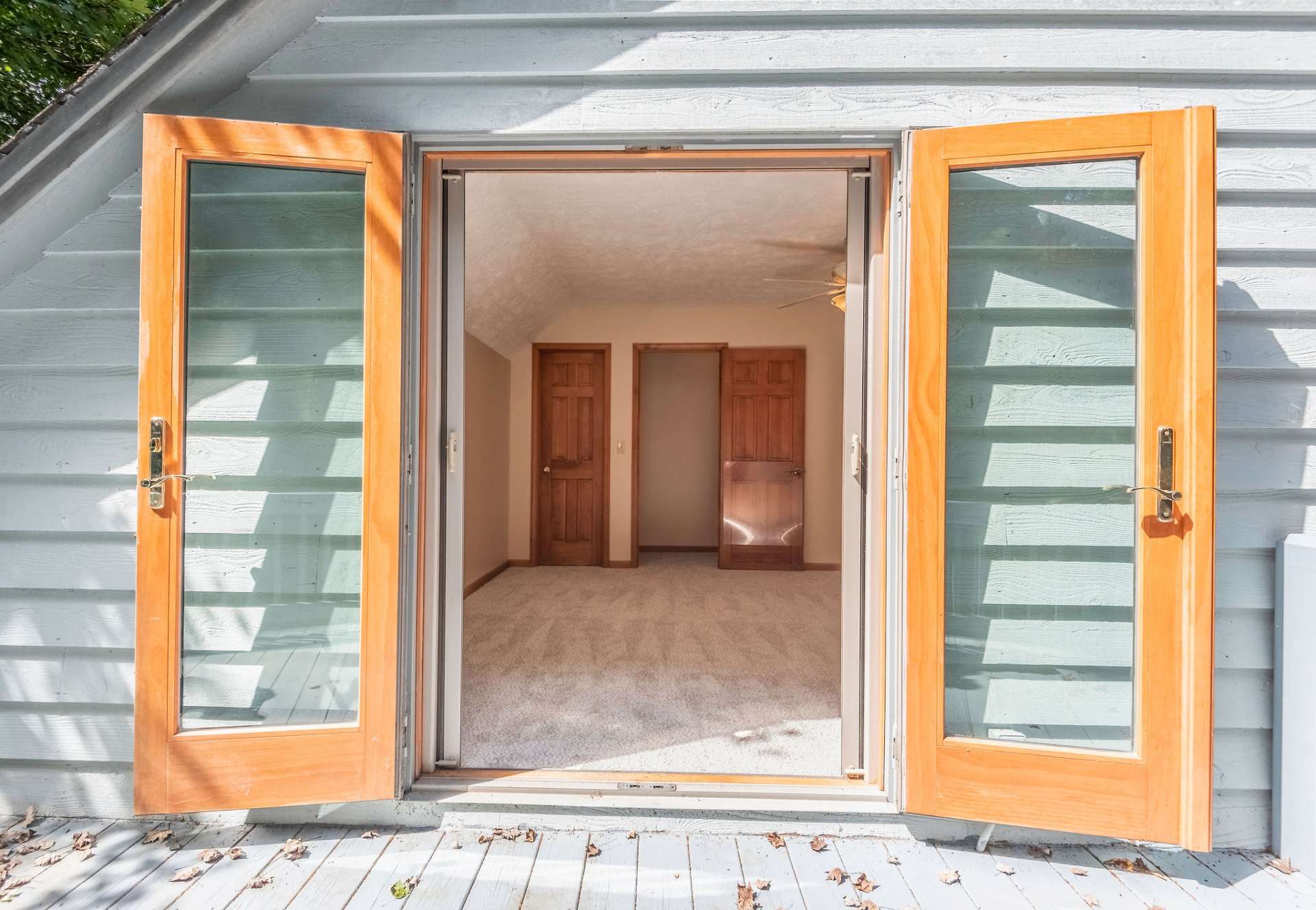 French doors and deck were added to the master suite.