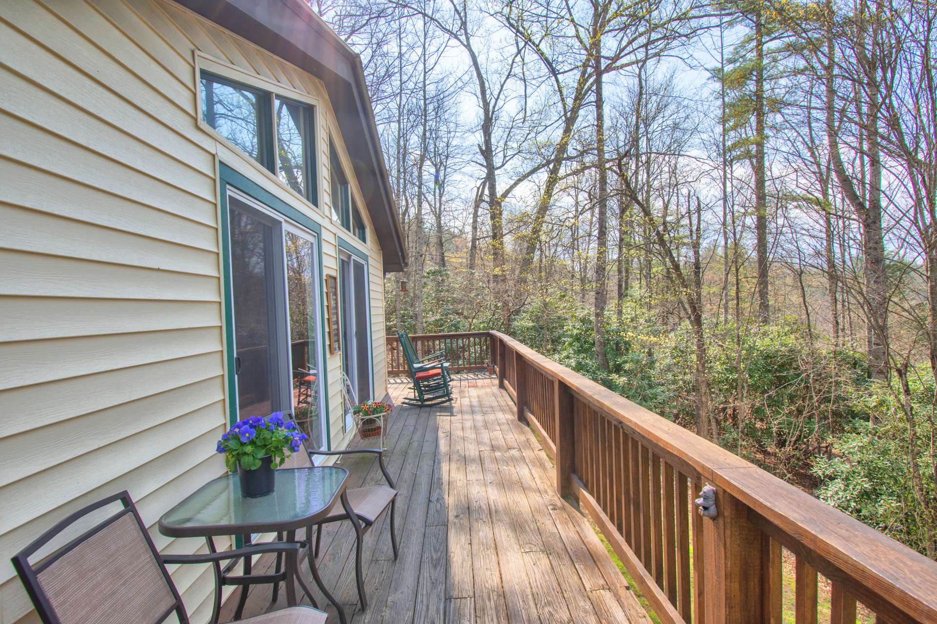 A deck wraps around three sides of the cottage and provides lots of space for outdoor grilling, dining and entertaining.