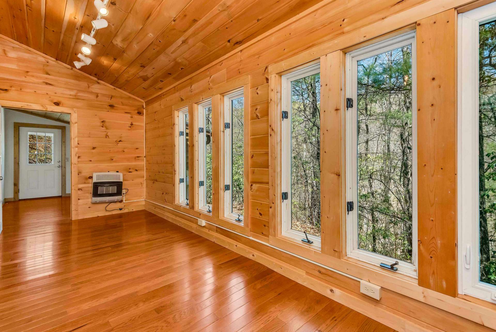 Sunroom area is perfect for relaxing and reading your favorite book.