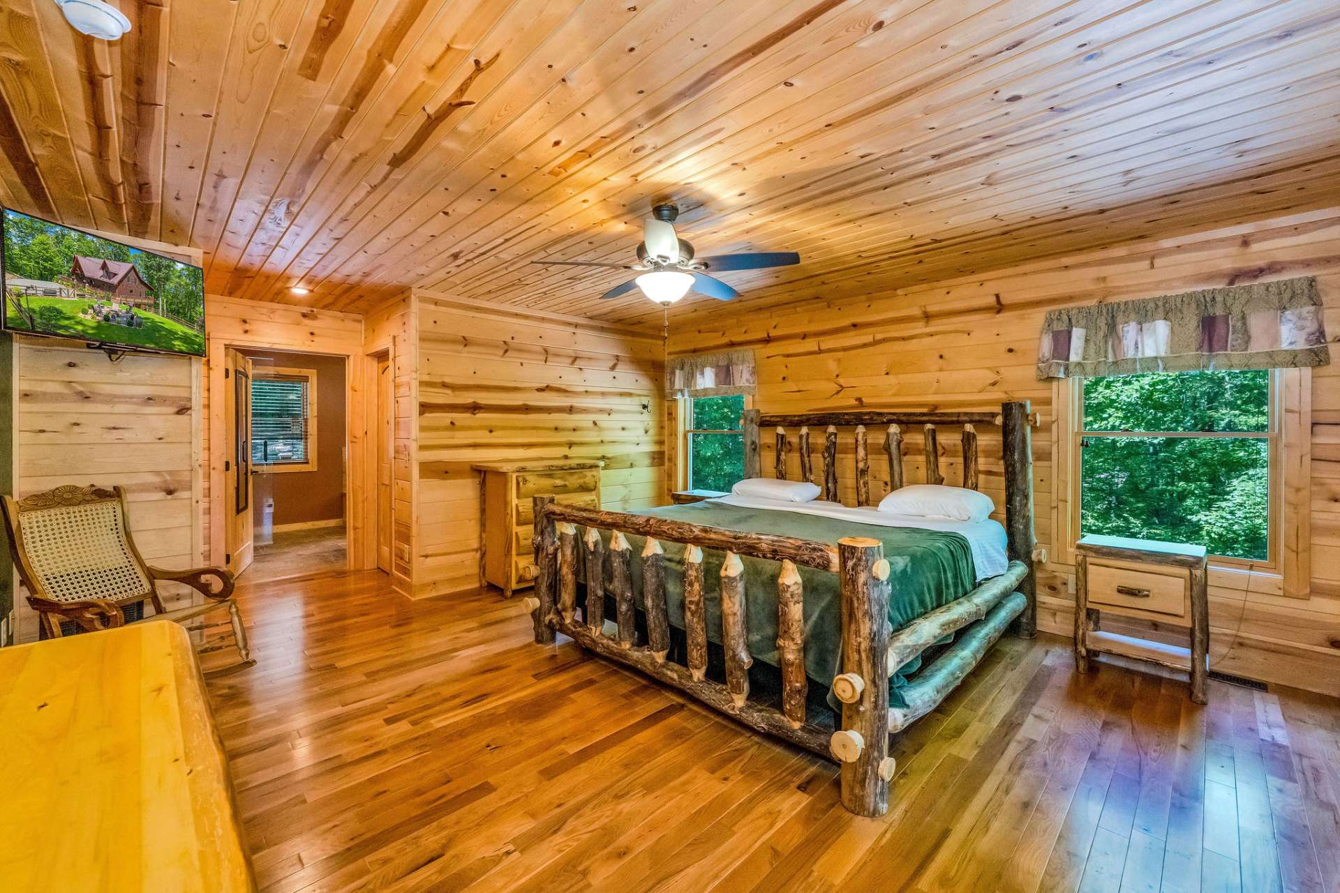 The primary suite on the main level provides comfort and ease.