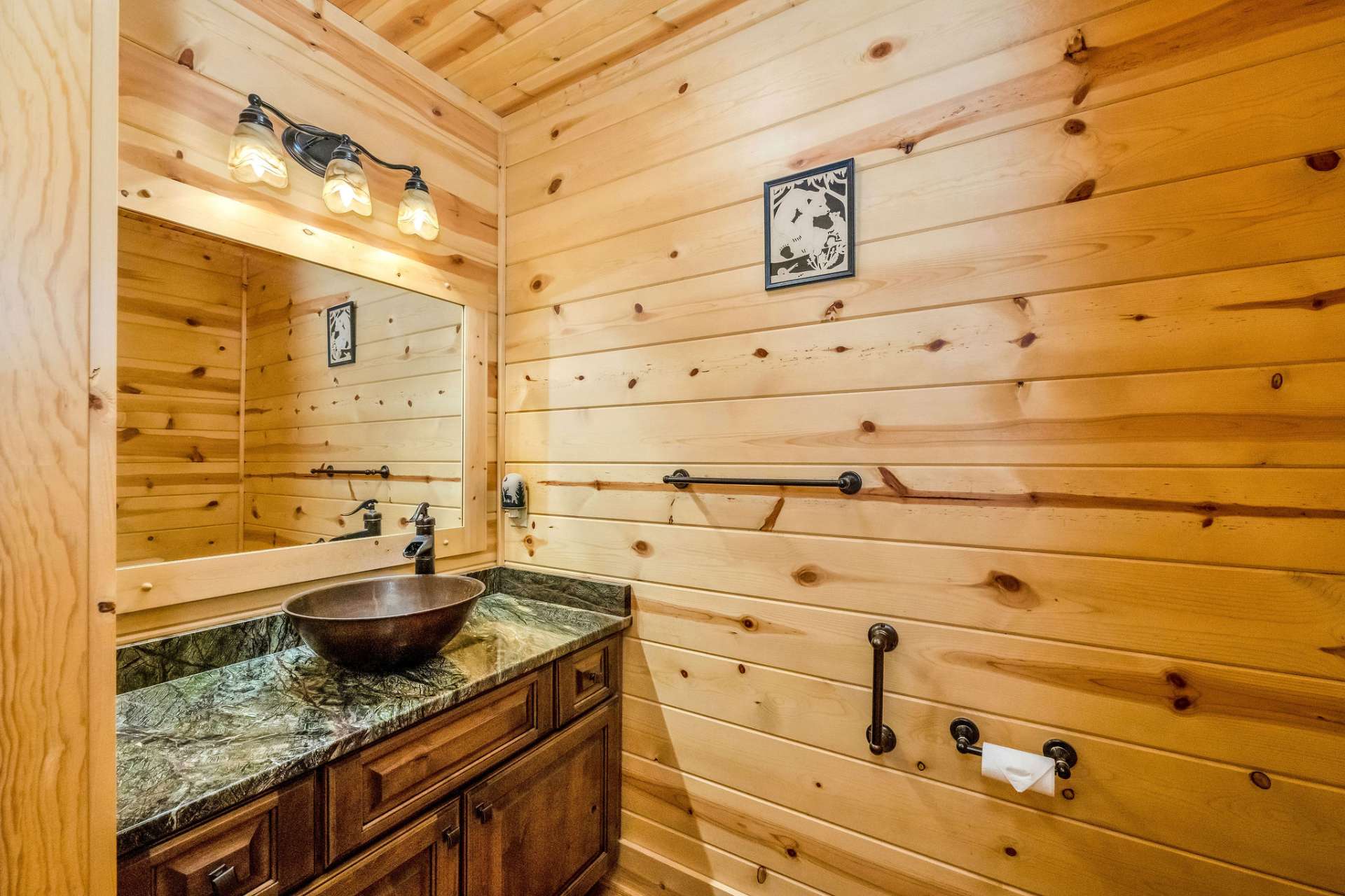 Your visitors will enjoy this stylish half-bath.