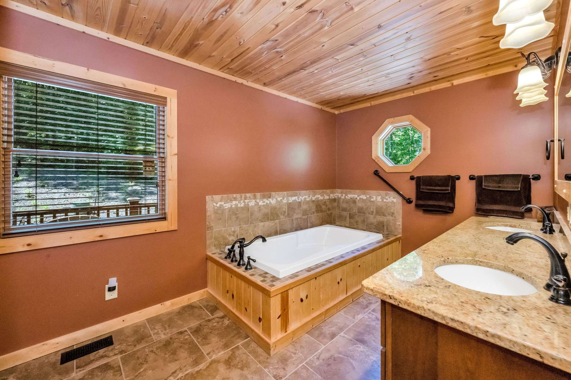 The primary spa-style bath with heated flooring.