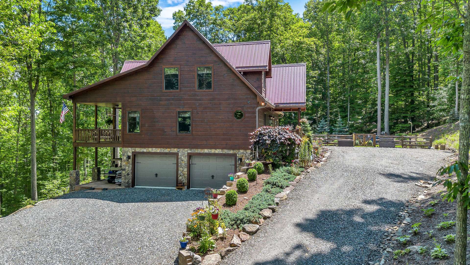 Enjoy end-of-road privacy and upper and lower parking. The oversized 2-car garage features 2 workbenches.