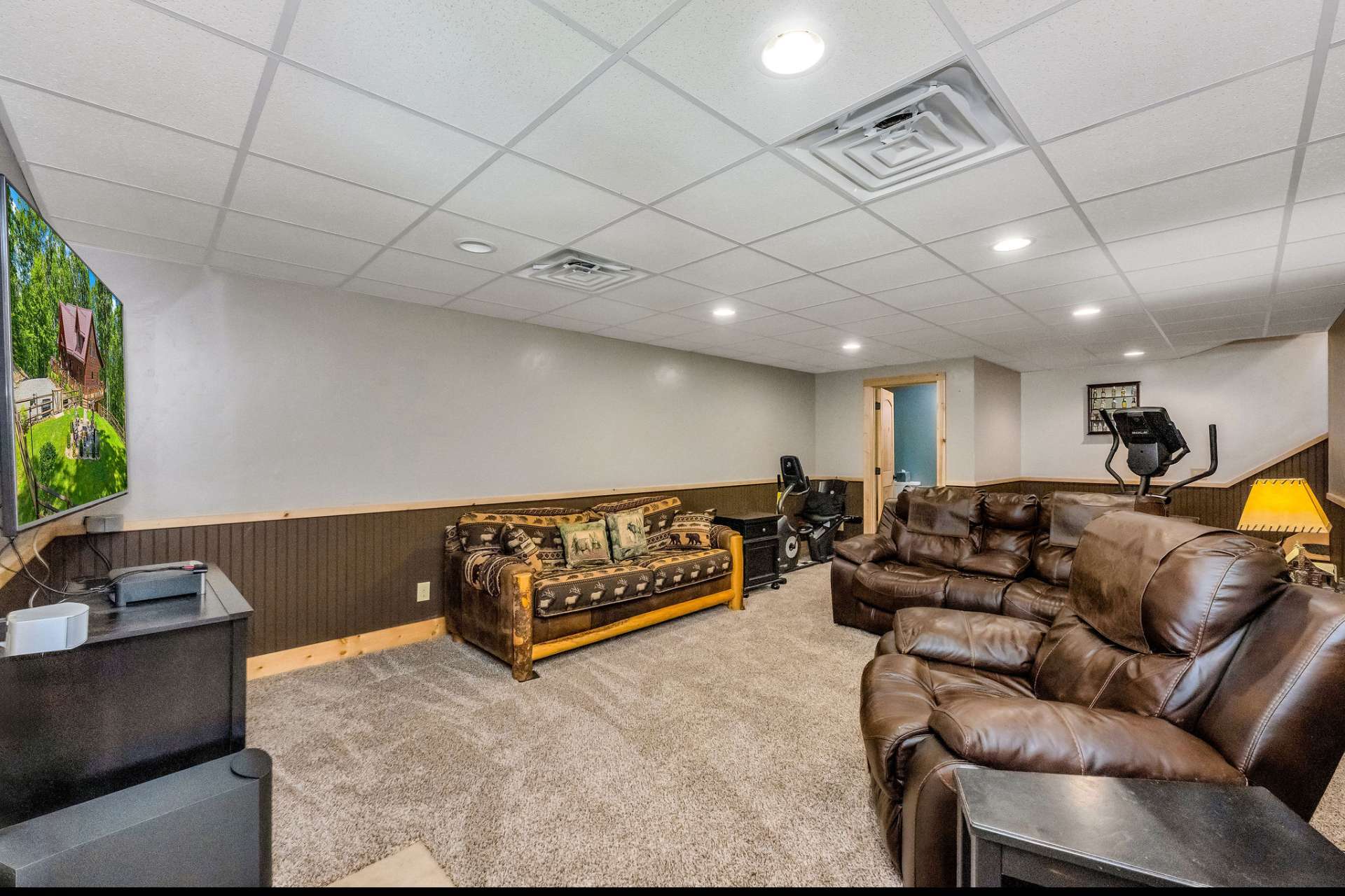 This versatile area provides space for casual hangouts, hobbies, or a cozy media area.