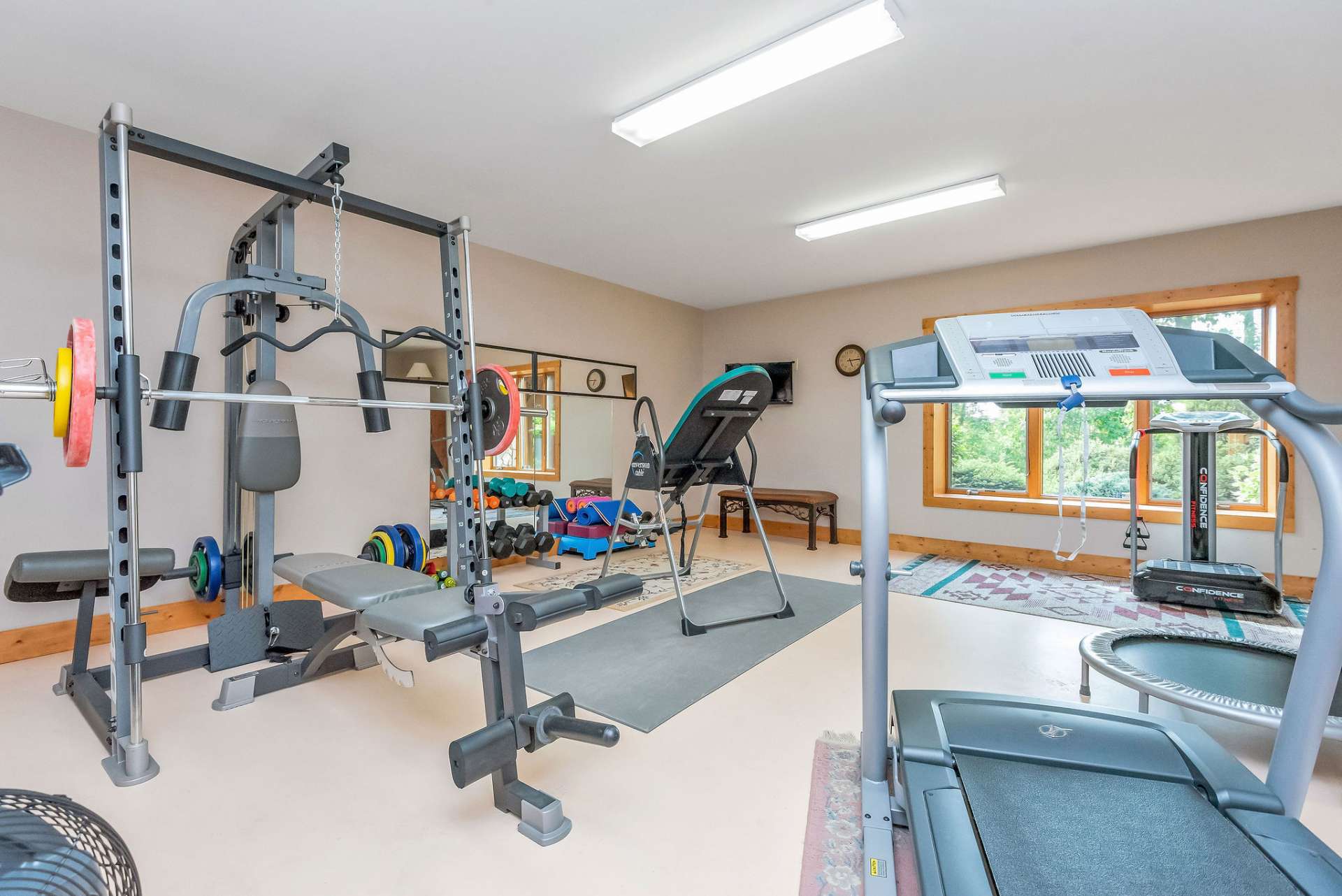 The fitness area is not heated and not counted in the heated living square footage.