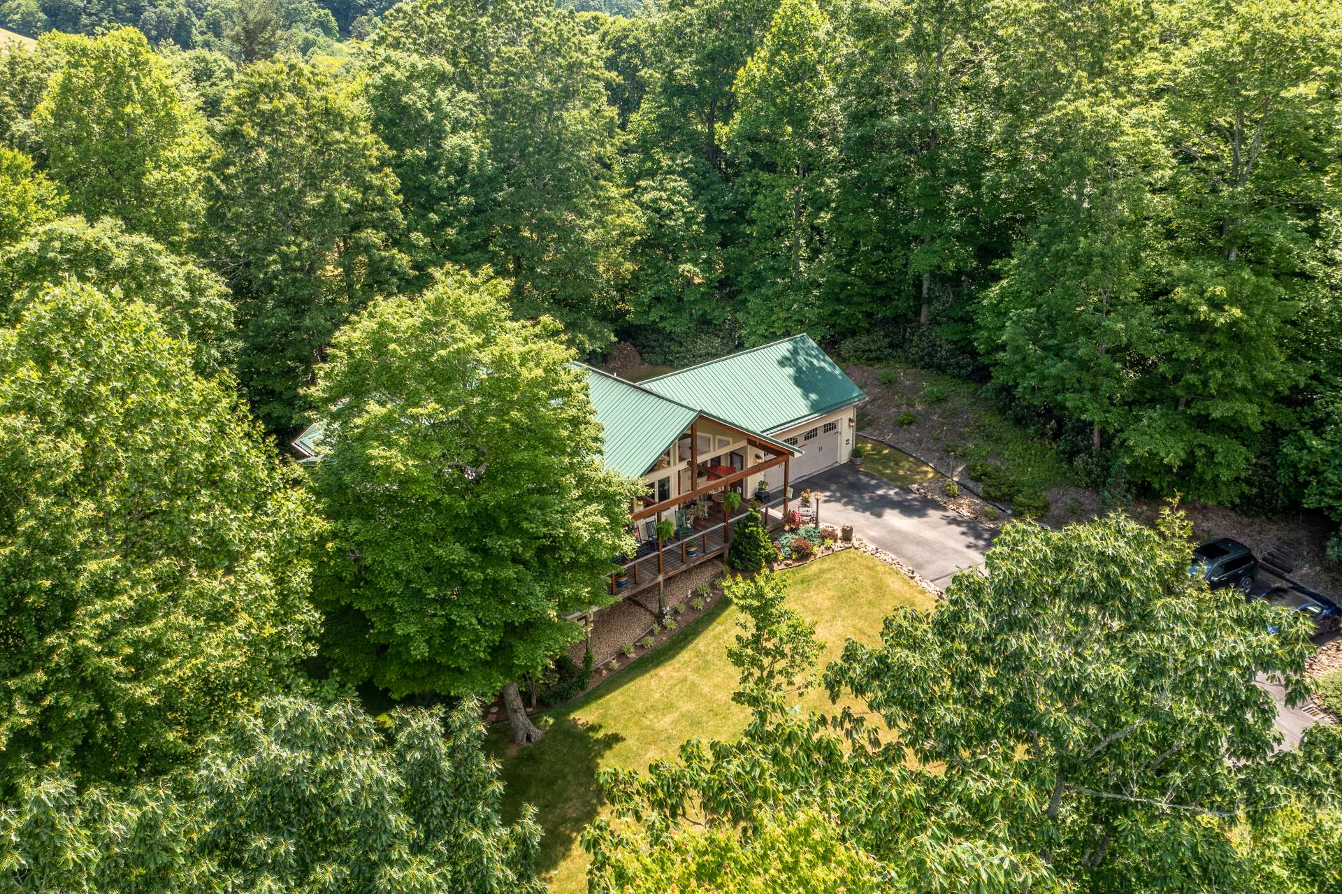 No other homes visible from inside this mountain sanctuary or even from the decks.  With all three surrounding mountain ranges protected, there’s little to no chance of ever seeing homes built in the future.  Indeed, a unique setting!