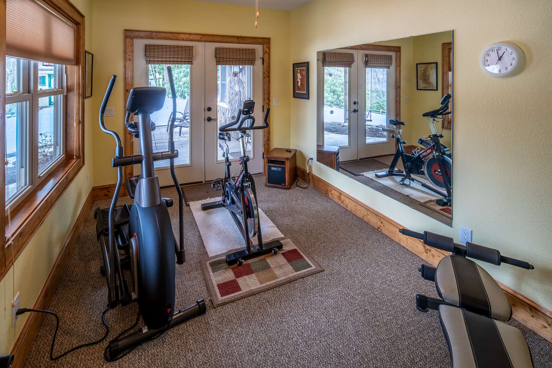 This bonus room is perfect for a small home gym or it could serve as a fourth bedroom if needed. It also provides access to the patio.