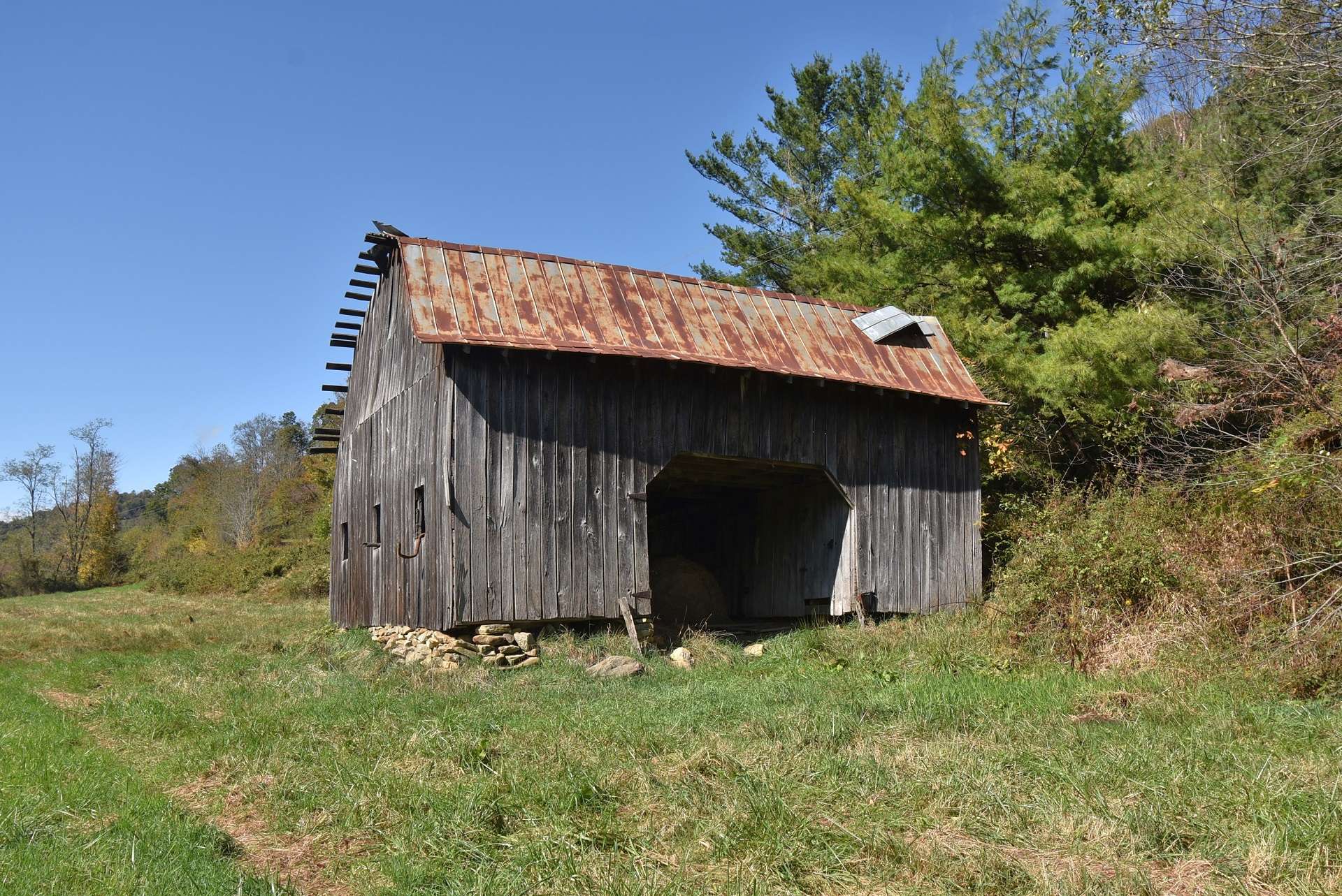 The property has plenty of barns and outbuildings for your farm animals and equipment.