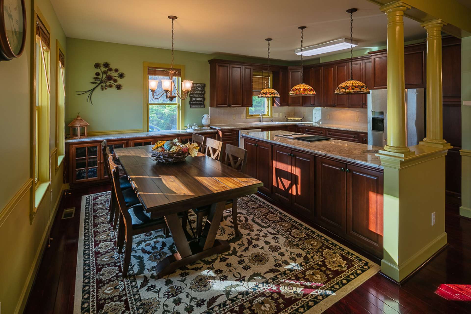 The kitchen is open to the dining and living areas and offers lots of work and storage space.