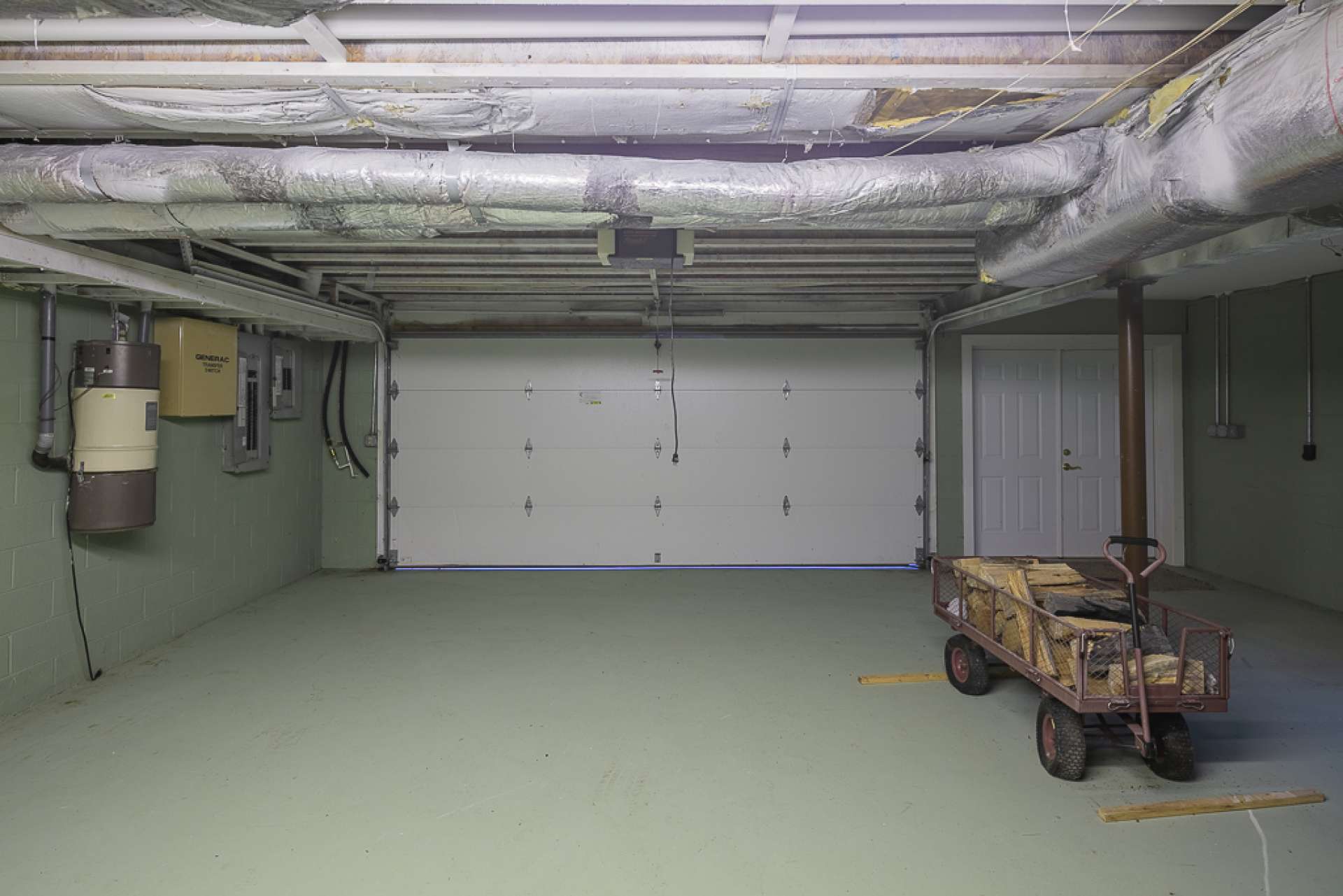 The garage/workshop area competes the lower level.