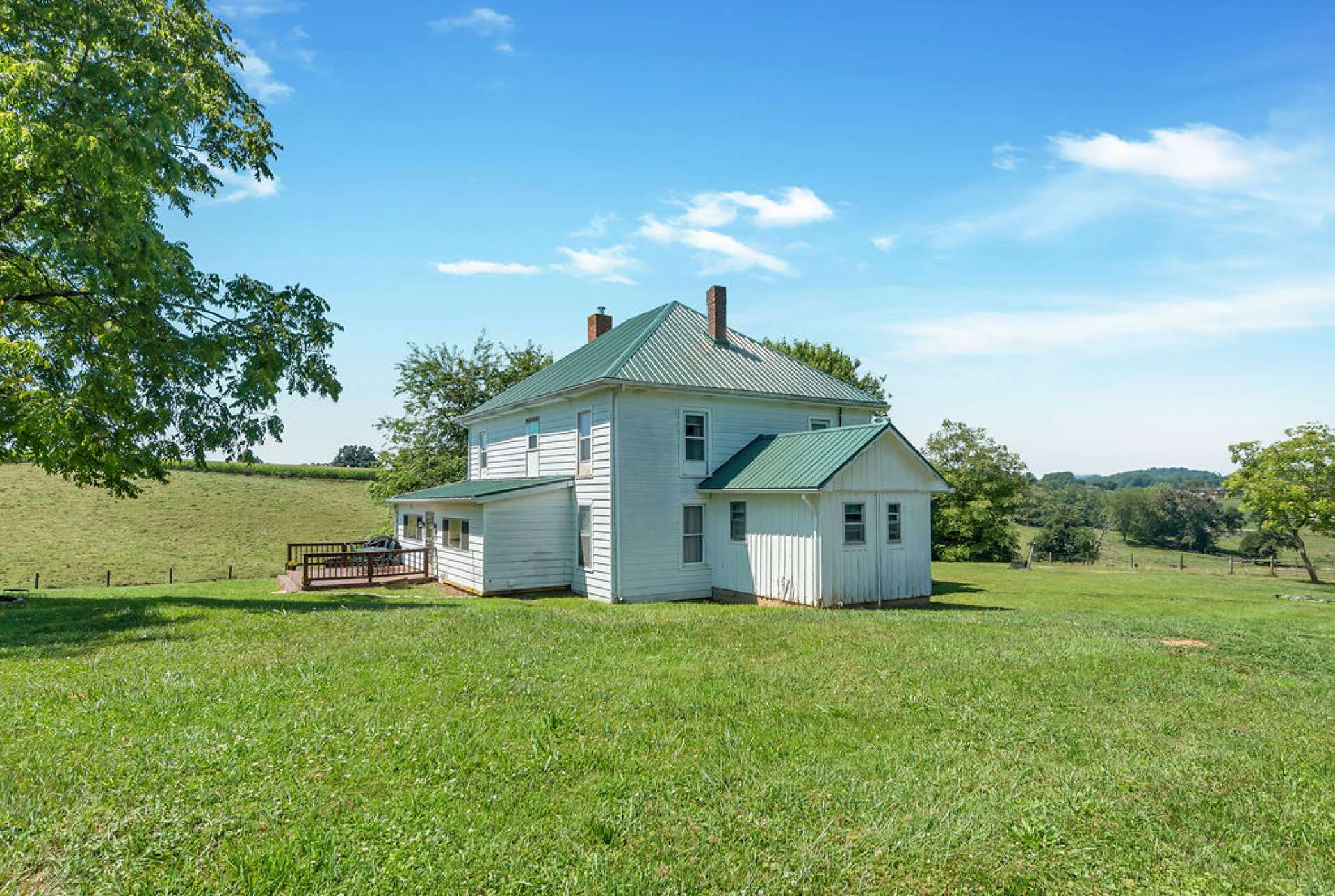 Level yard with pastoral and long range views.