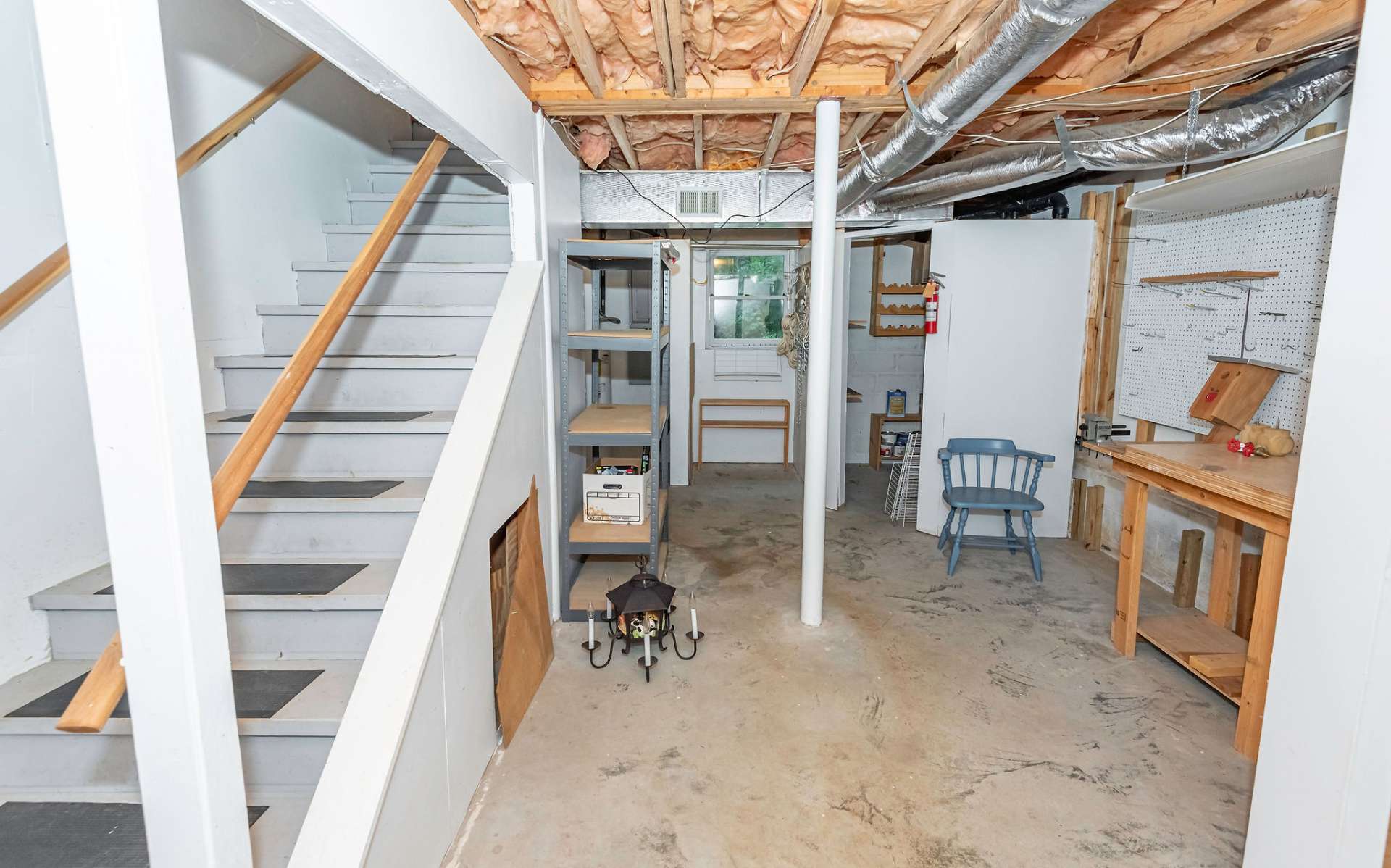 The lower level offers lots of work and storage space, along with finished space.