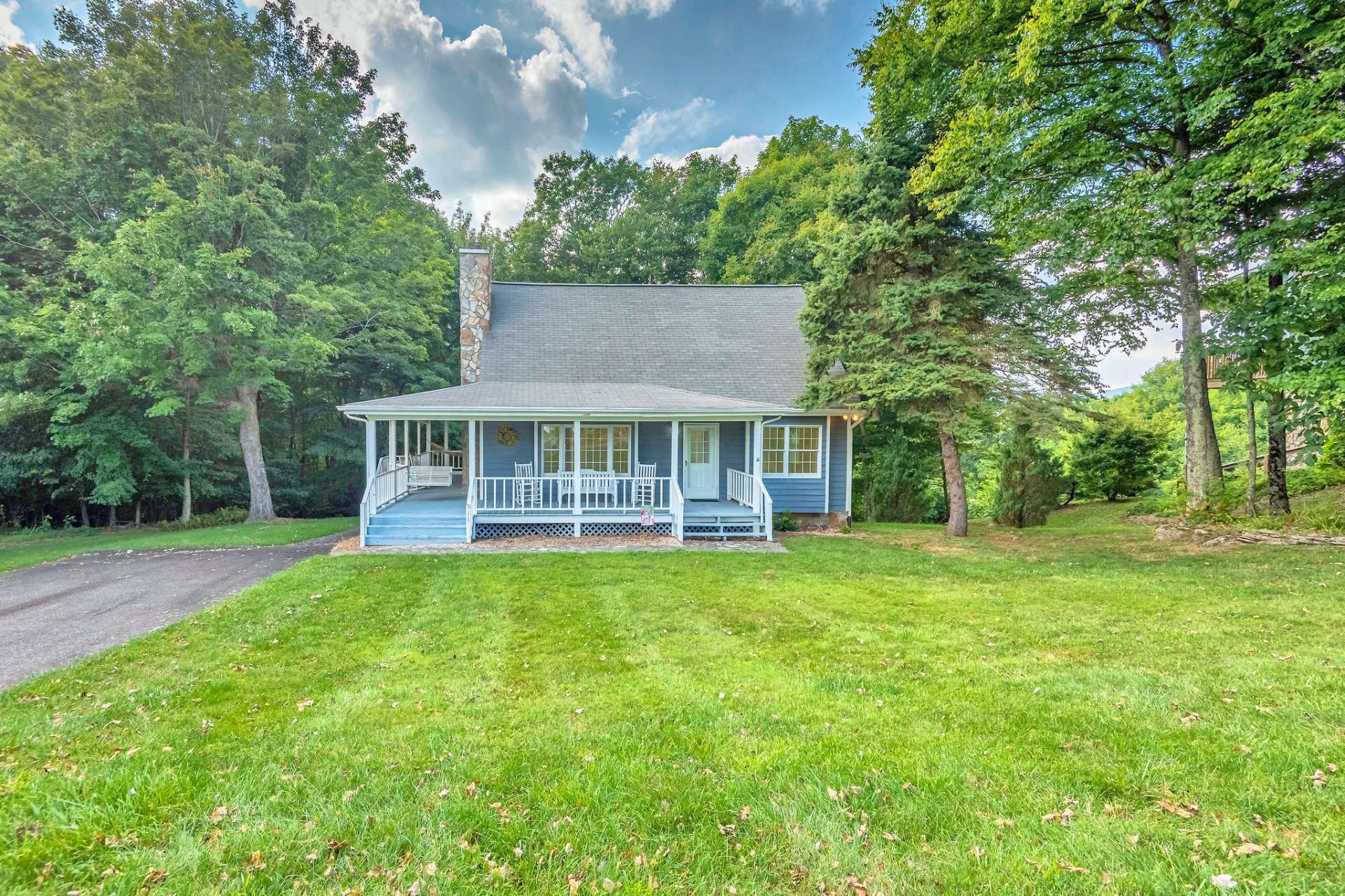 You will love the covered porch that wraps around three sides of the home.