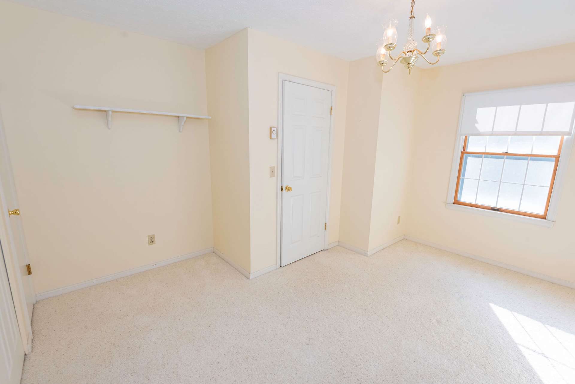 Both upper level bedrooms are bright and cheery.