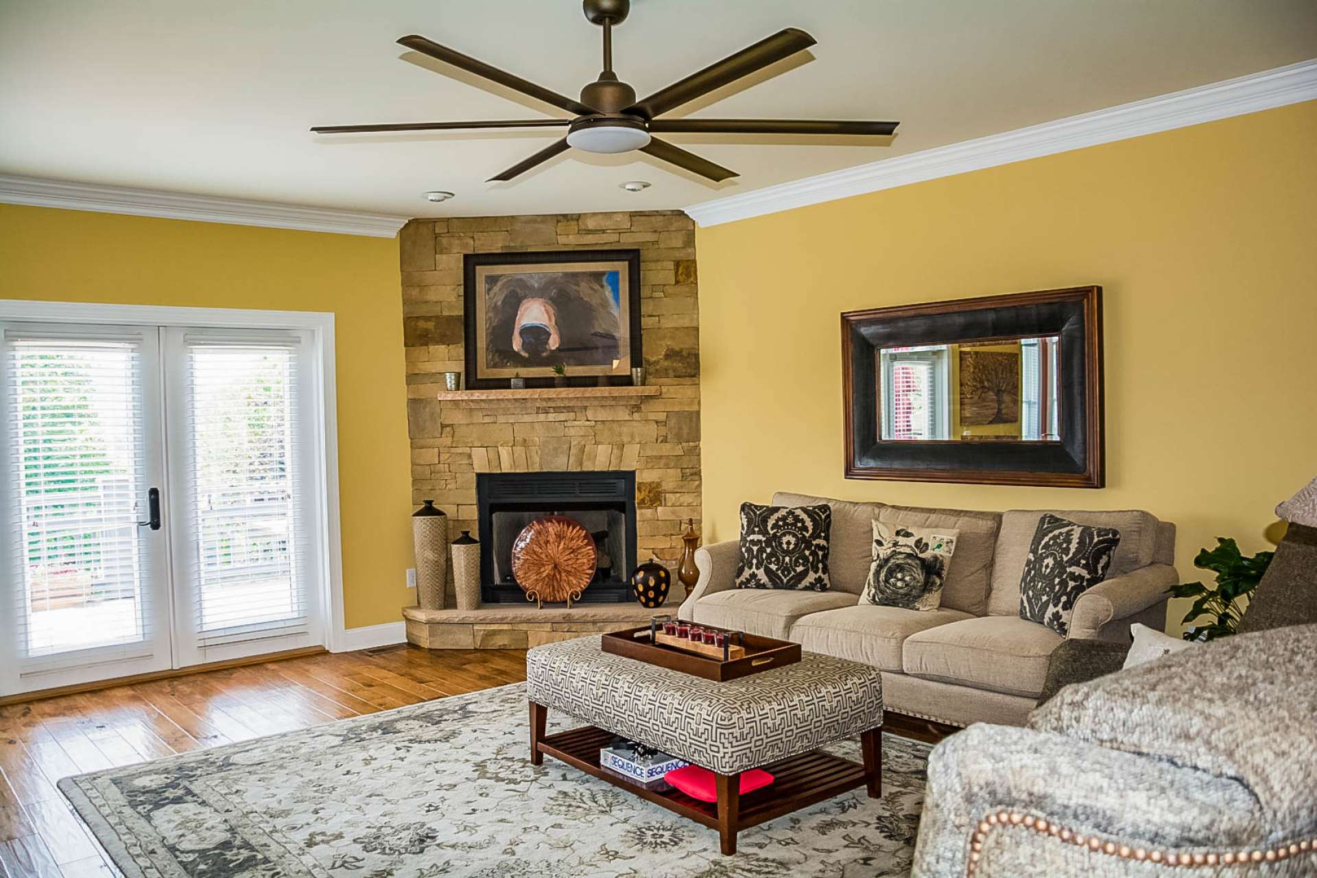 French doors open to the open back deck for easy transition when dining outdoors.