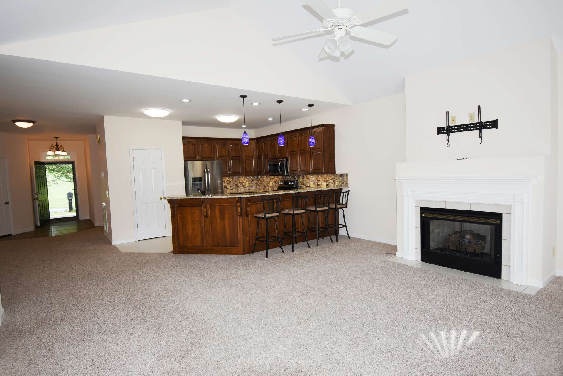 The living, dining, and kitchen areas are open to each other allowing easy flow when entertaining.