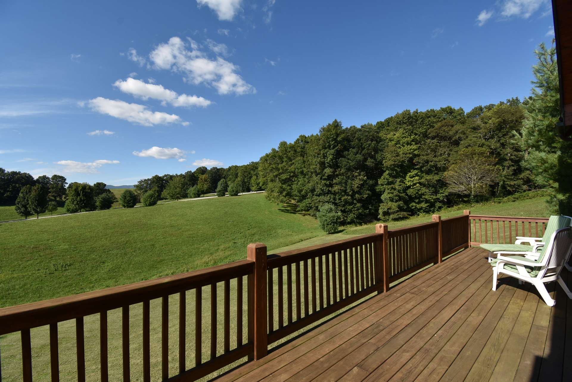 A full length open back deck offers plenty of outdoor grilling, dining and entertaining space. Or...simply relaxing with the views, gentle mountain breezes, and the sounds of Nature.