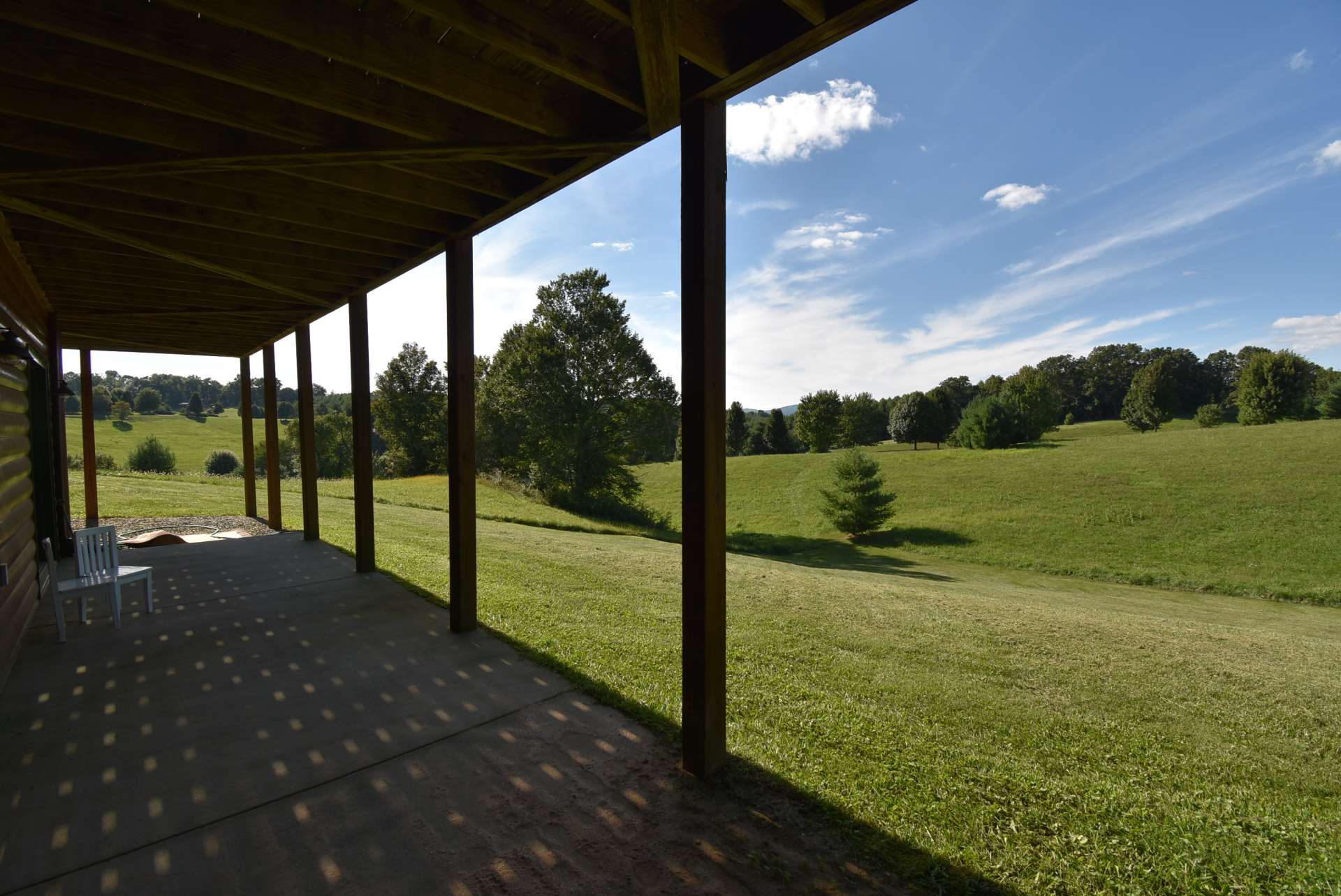 The lower level also offers a covered patio to enjoy the views and extend outdoor living space.