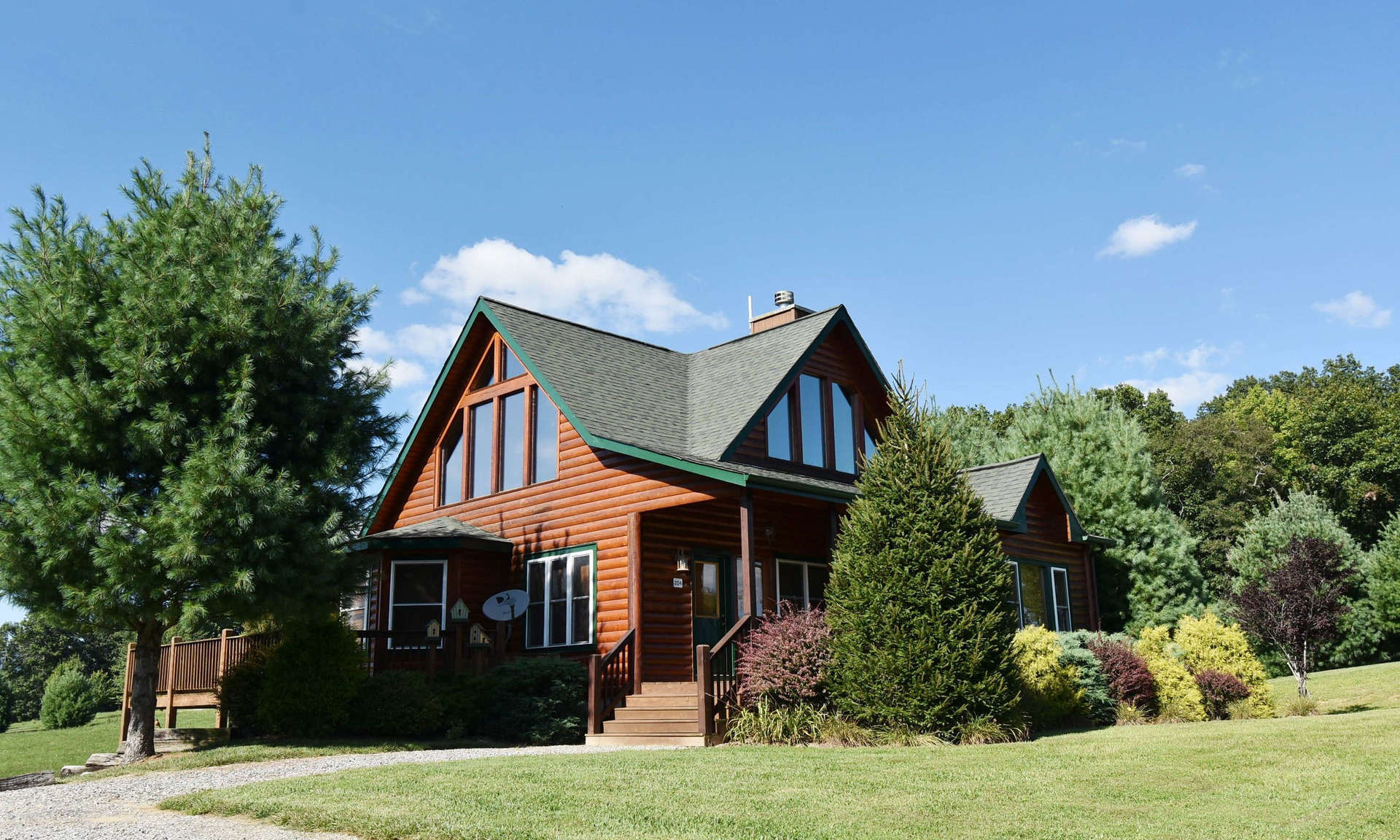 THE PERFECT CABIN! Enjoy gorgeous views from the decks and almost every window in this 3-bedroom, 3.5-bath home nestled in on a beautiful 1.47 acre setting in the Bear Creek community close to Sparta in Alleghany County, NC.