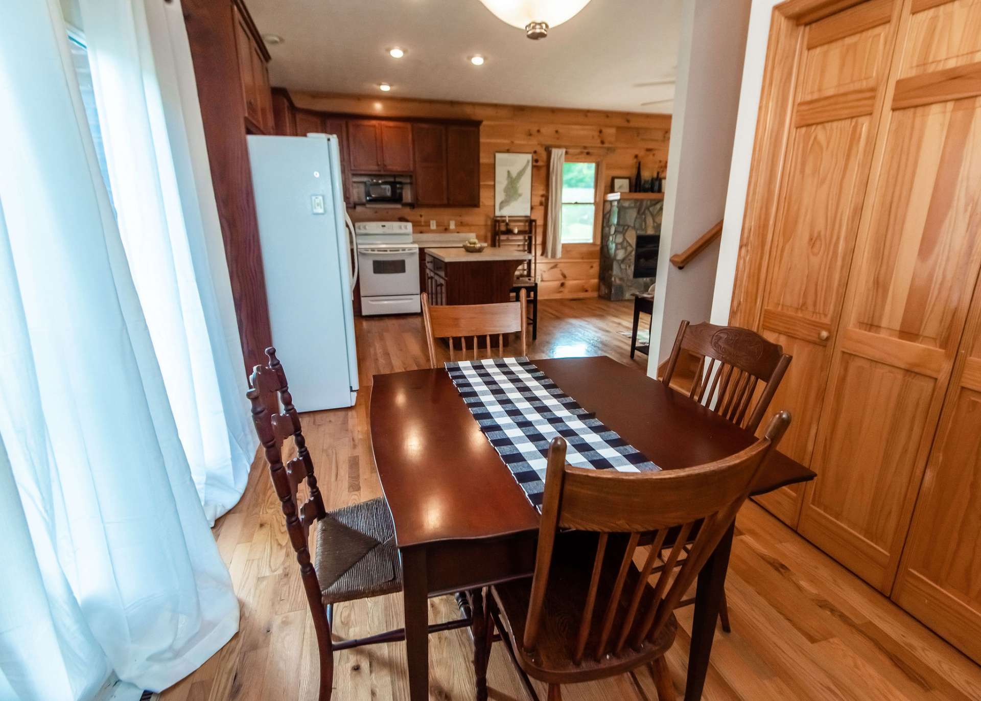 The formal dining area is large enough to entertain dinner guests and perfect for a candlelight dinner for two.