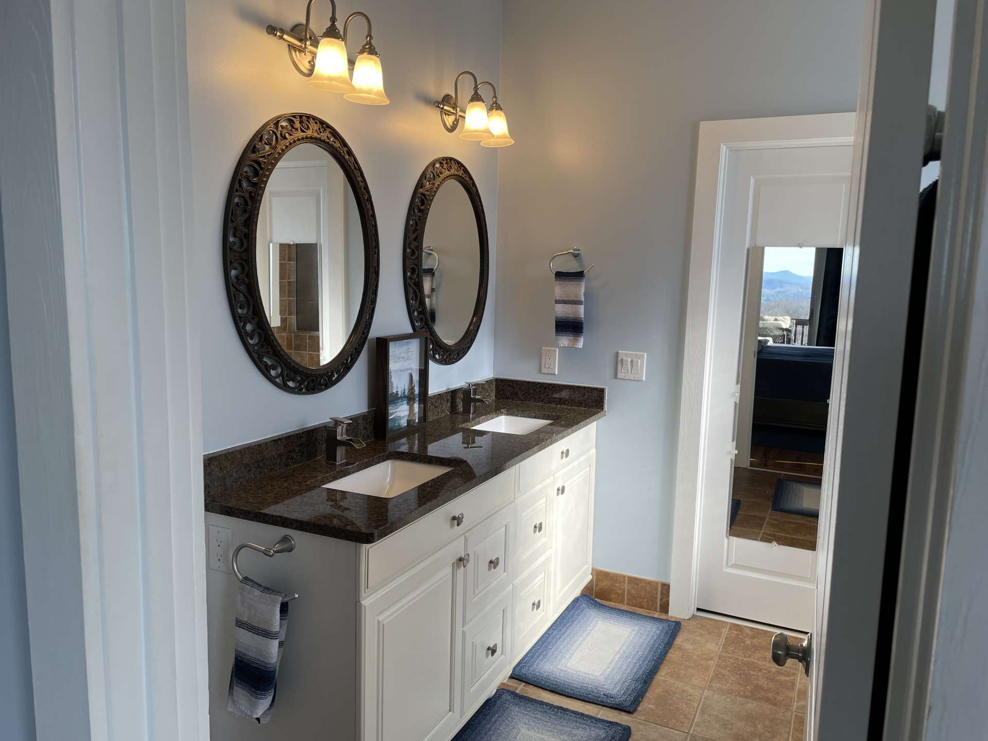 Double vanities in the primary bath.