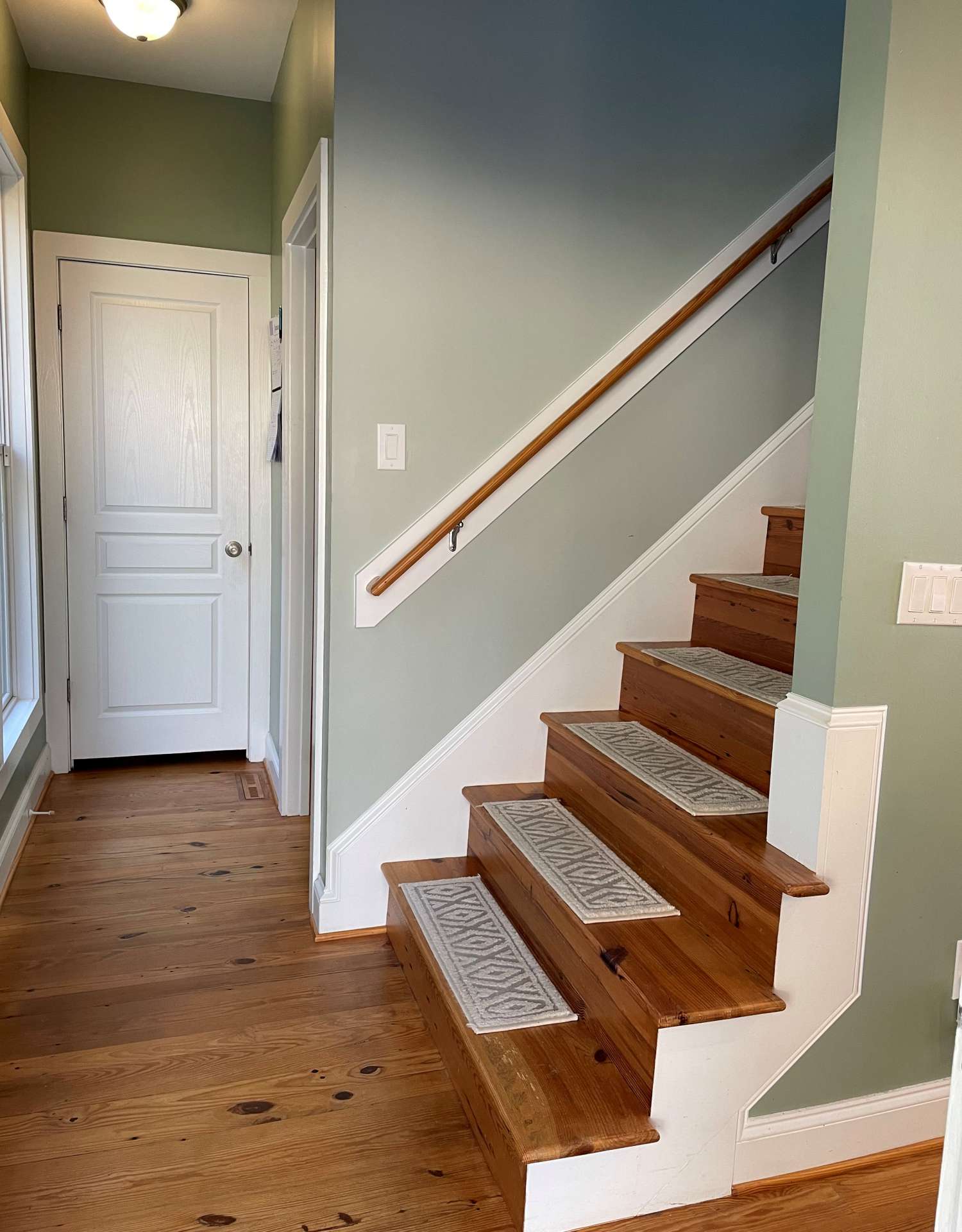 Heart pine flooring on the stairs to the 2nd level.