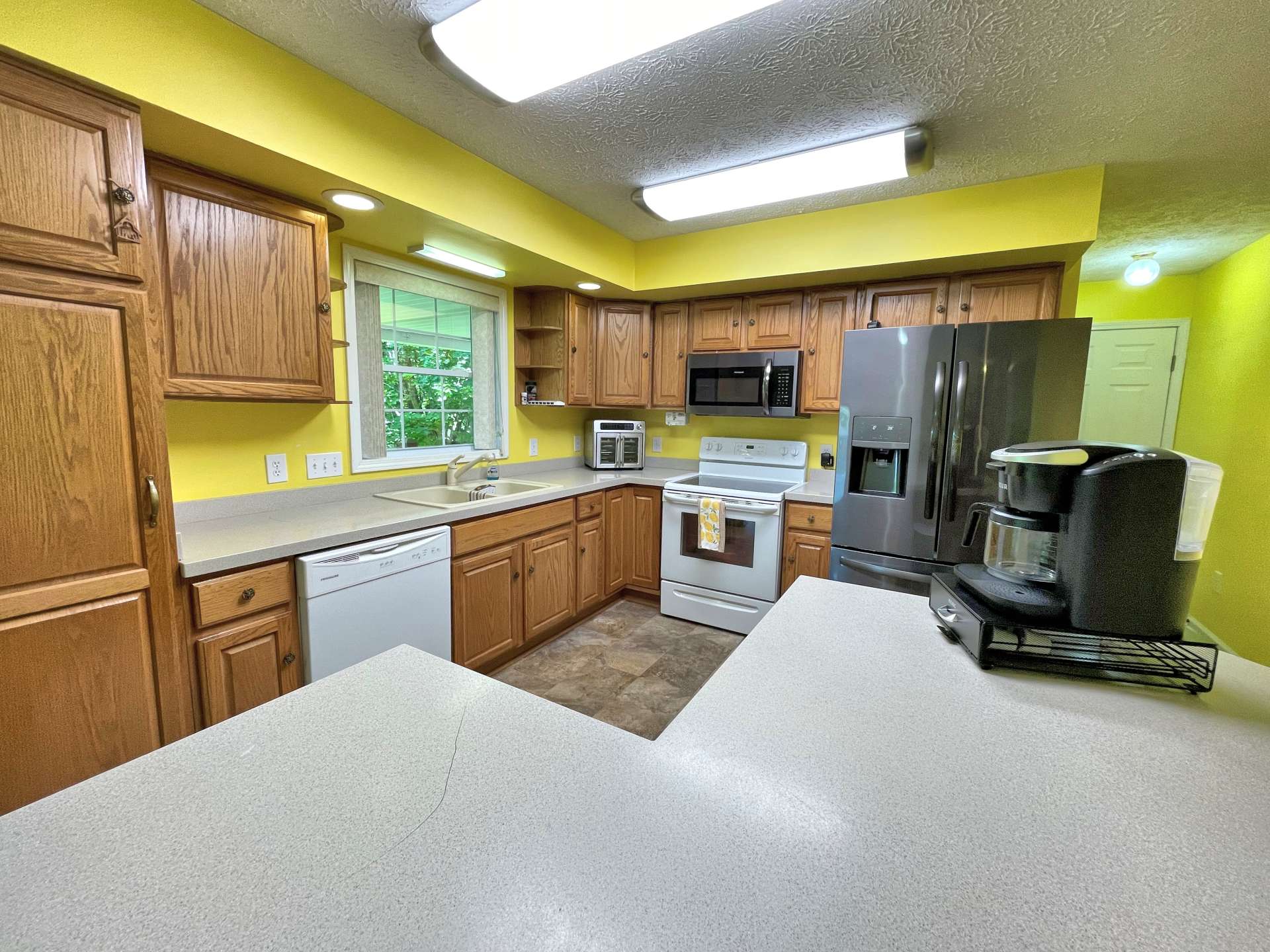 Well-appointed country kitchen with ample work and storage space