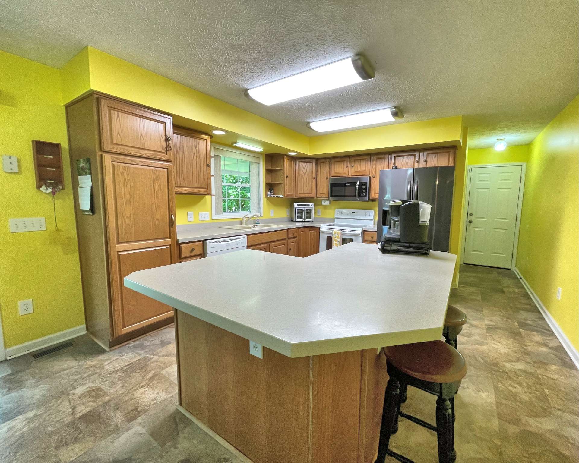 Includes an island with bar seating