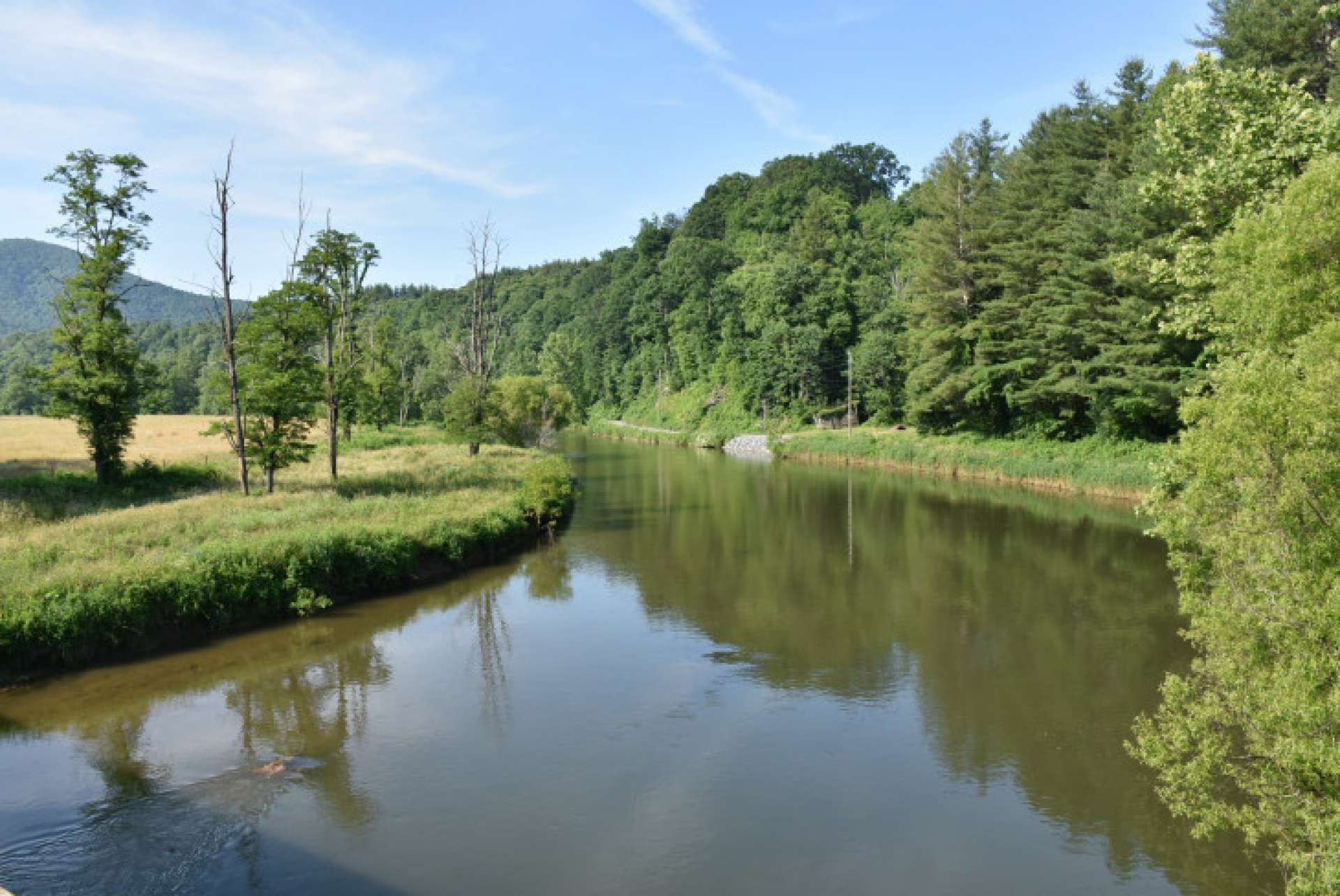 You will enjoy a beautiful drive into the property along the South Fork of the New River.