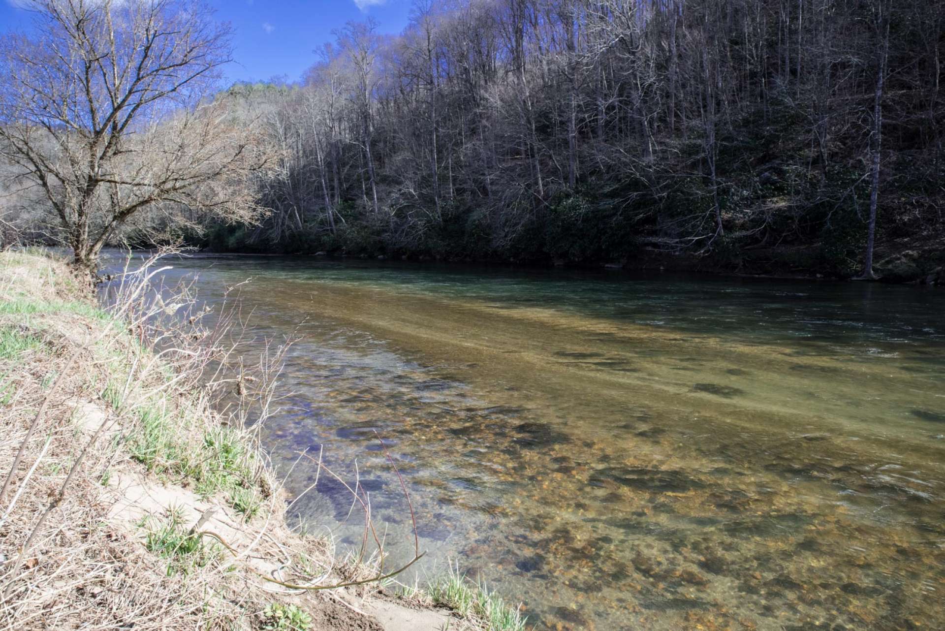 Call today for additional information on lot 38 of the Fox Hall community along the banks of the South Fork of the New River in the Laurel Springs area of Ashe County in the NC Mountains. Listing ID is W258-LE.