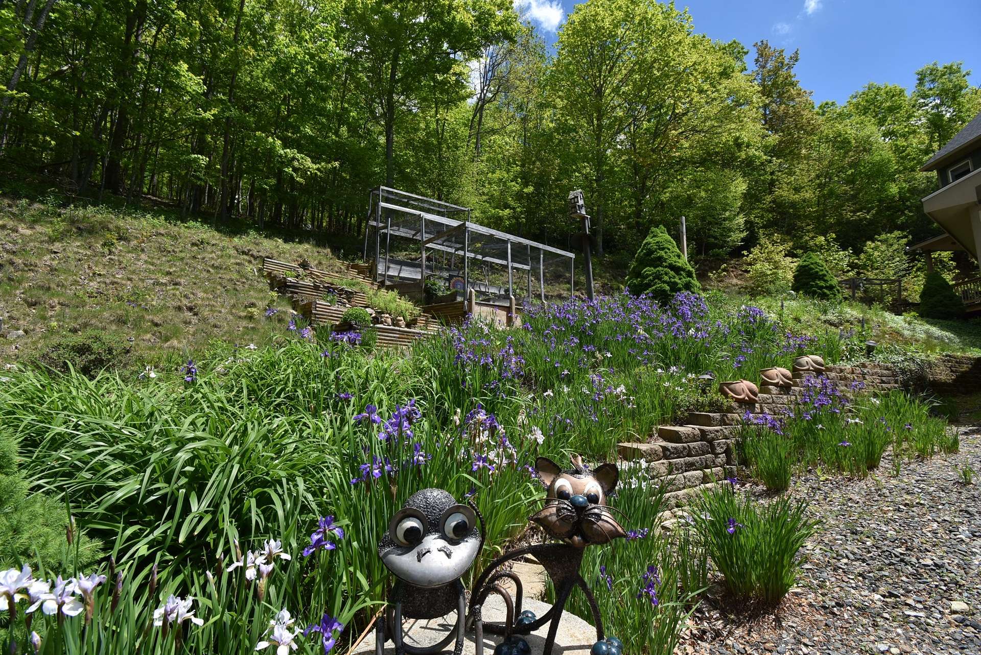 You will enjoy many years of beautifully planted perennials, annuls, and shrubbery providing blooms and color throughout the four seasons in the NC Mountains.