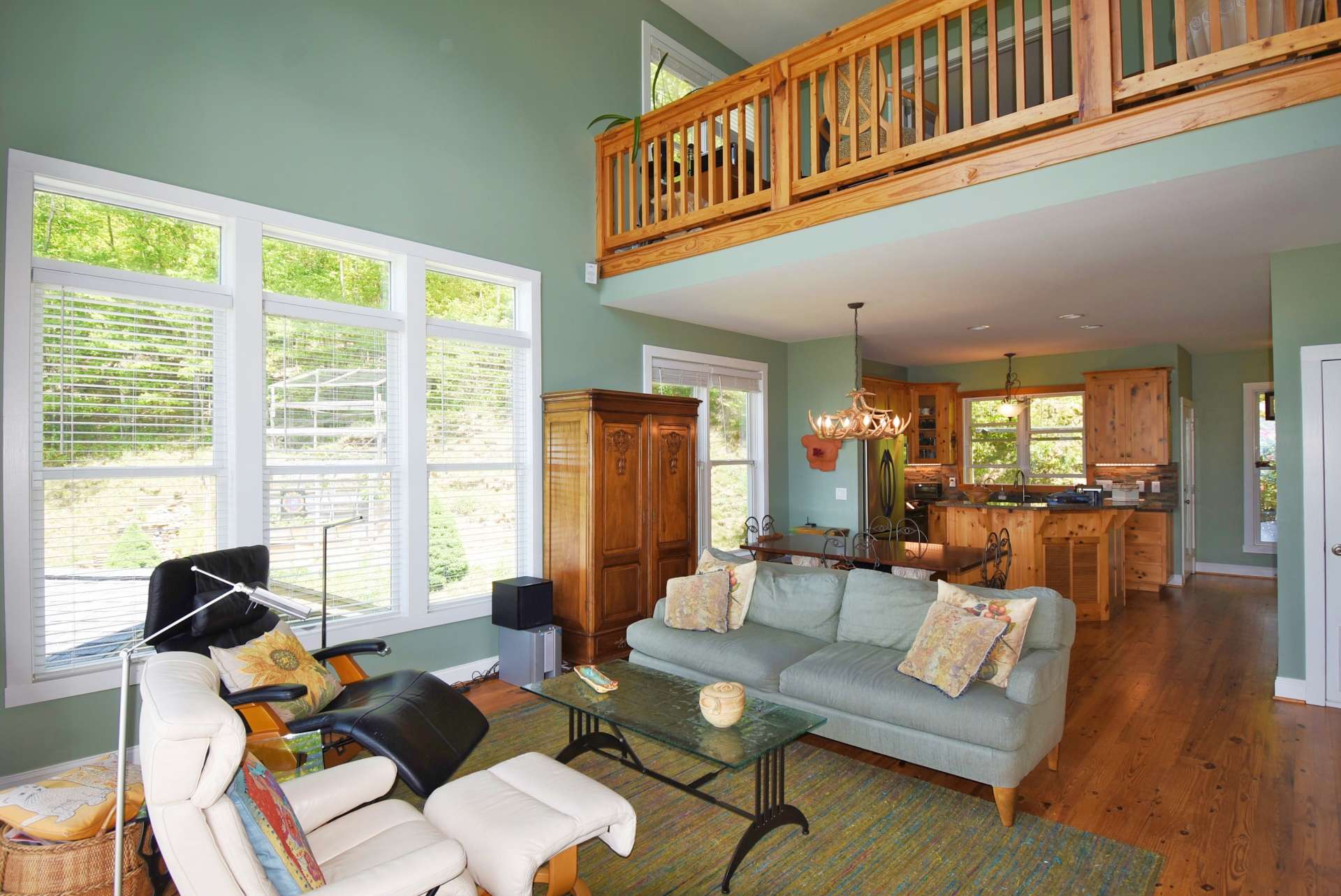 The great room leads into the kitchen and dining area.