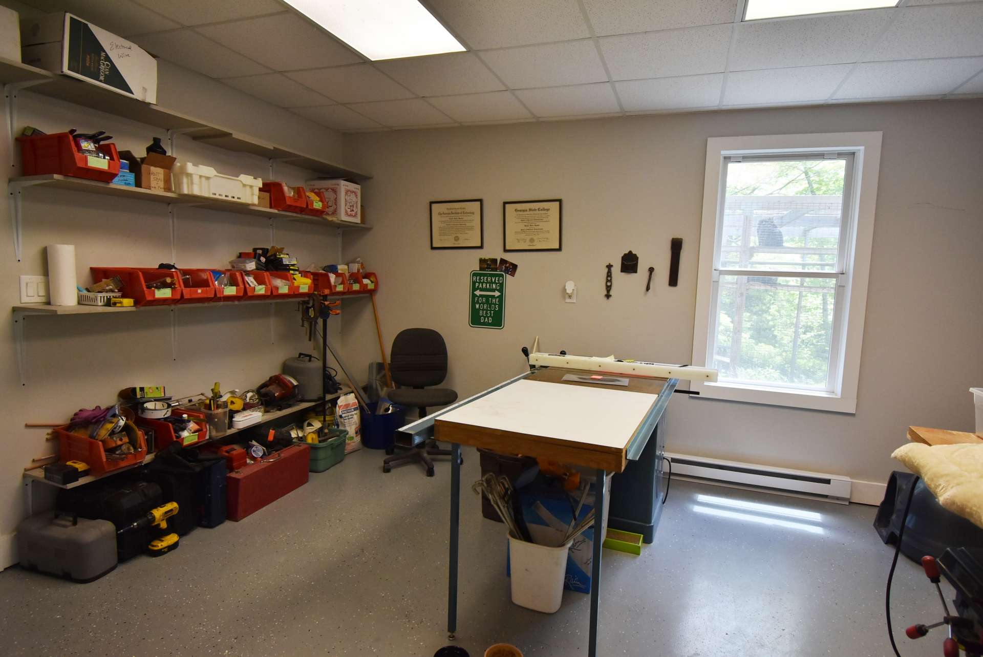 To complete the lower level, this workshop area is sure to please the handyman in the family.