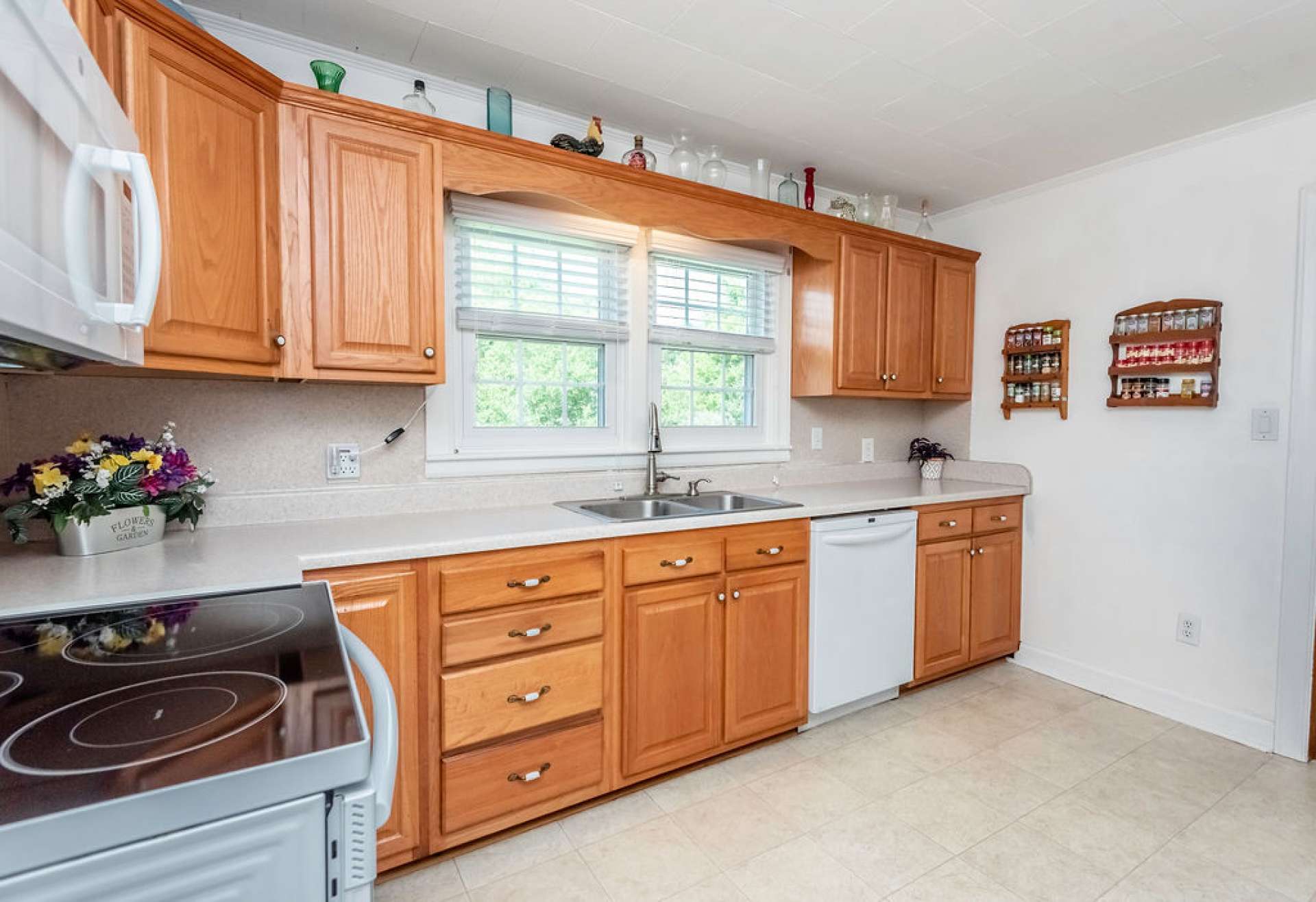 Kitchen has newer stove, microwave and dishwasher.