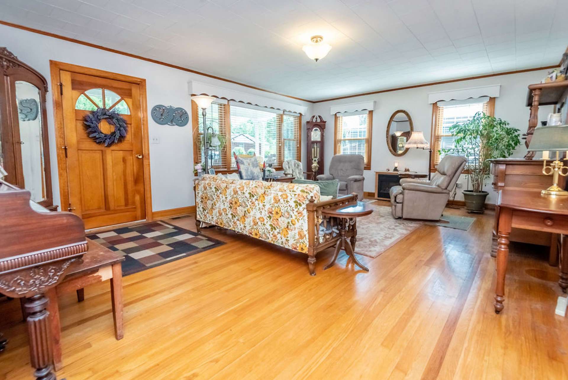 Hardwood flooring throughout with the exception of kitchen and bathrooms.