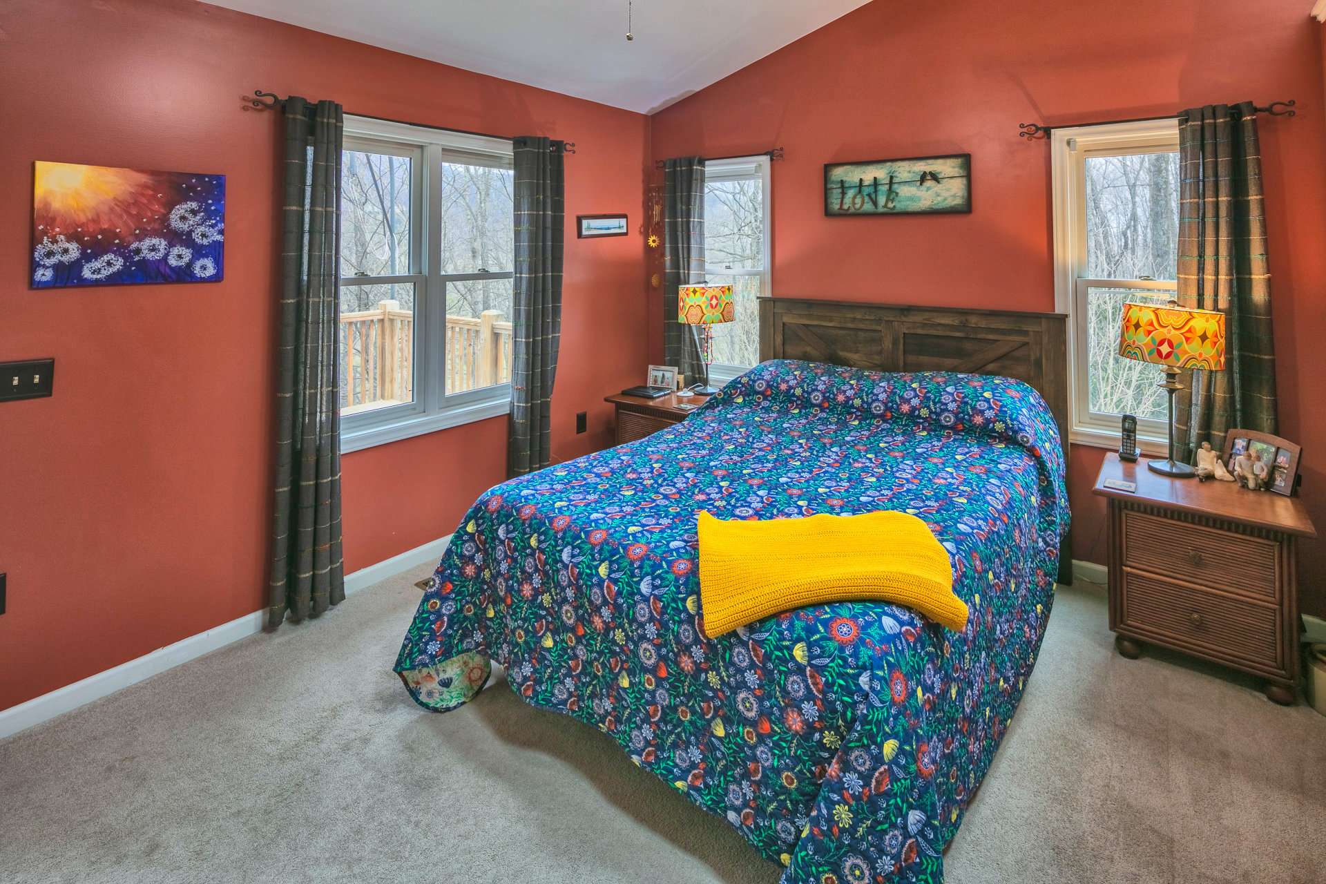 Conveniently located on the main level, the master suite offers a private bath and private access to the back deck.