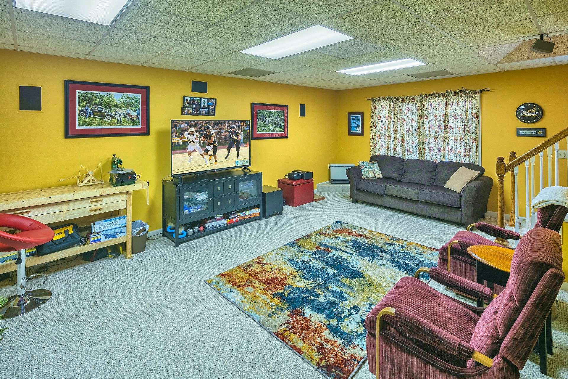 The lower level offers a large area for the den area, game room, or play area.