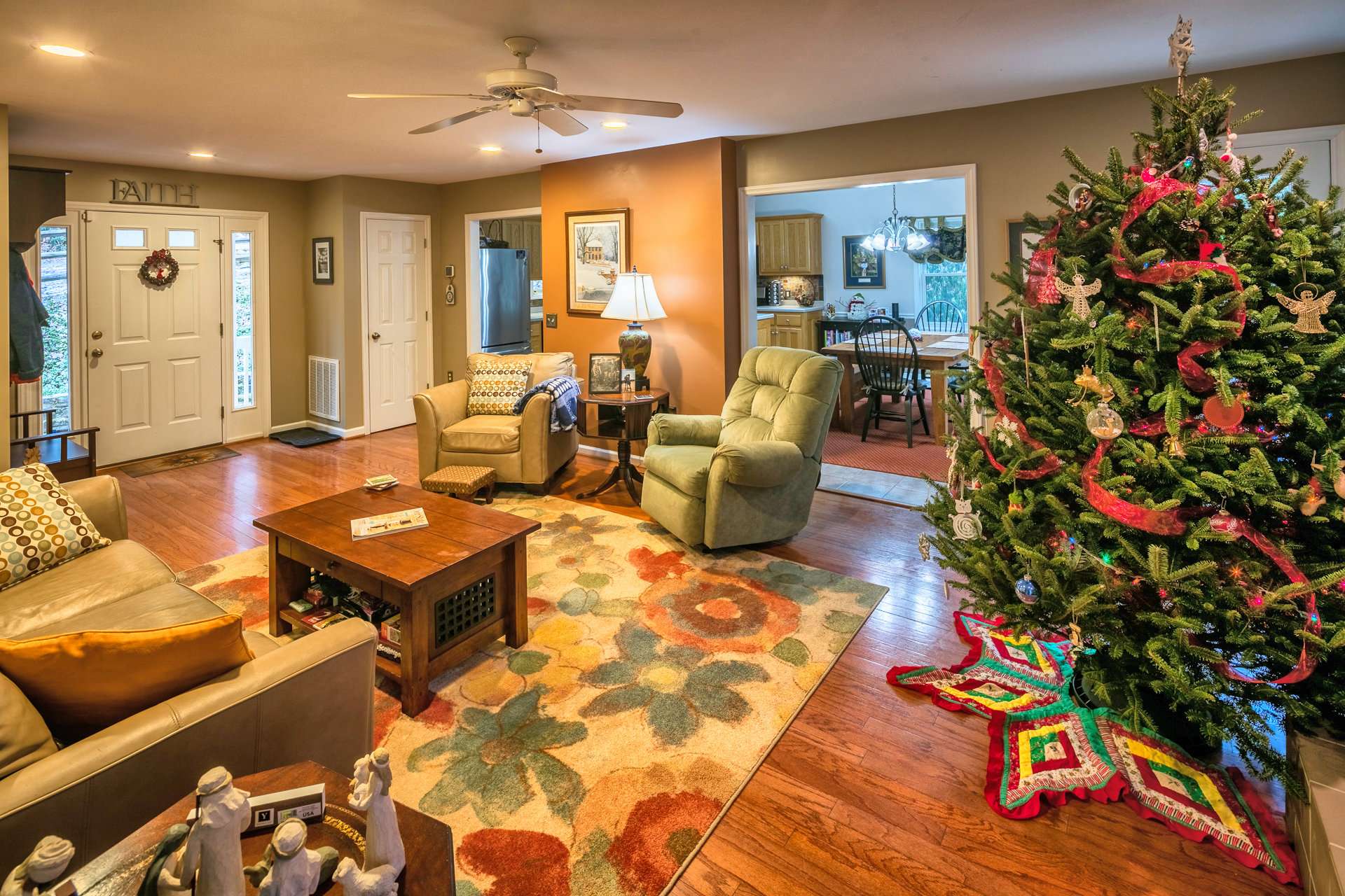 The living area is open to the kitchen and dining areas creating easy transition from one area to the other when entertaining.