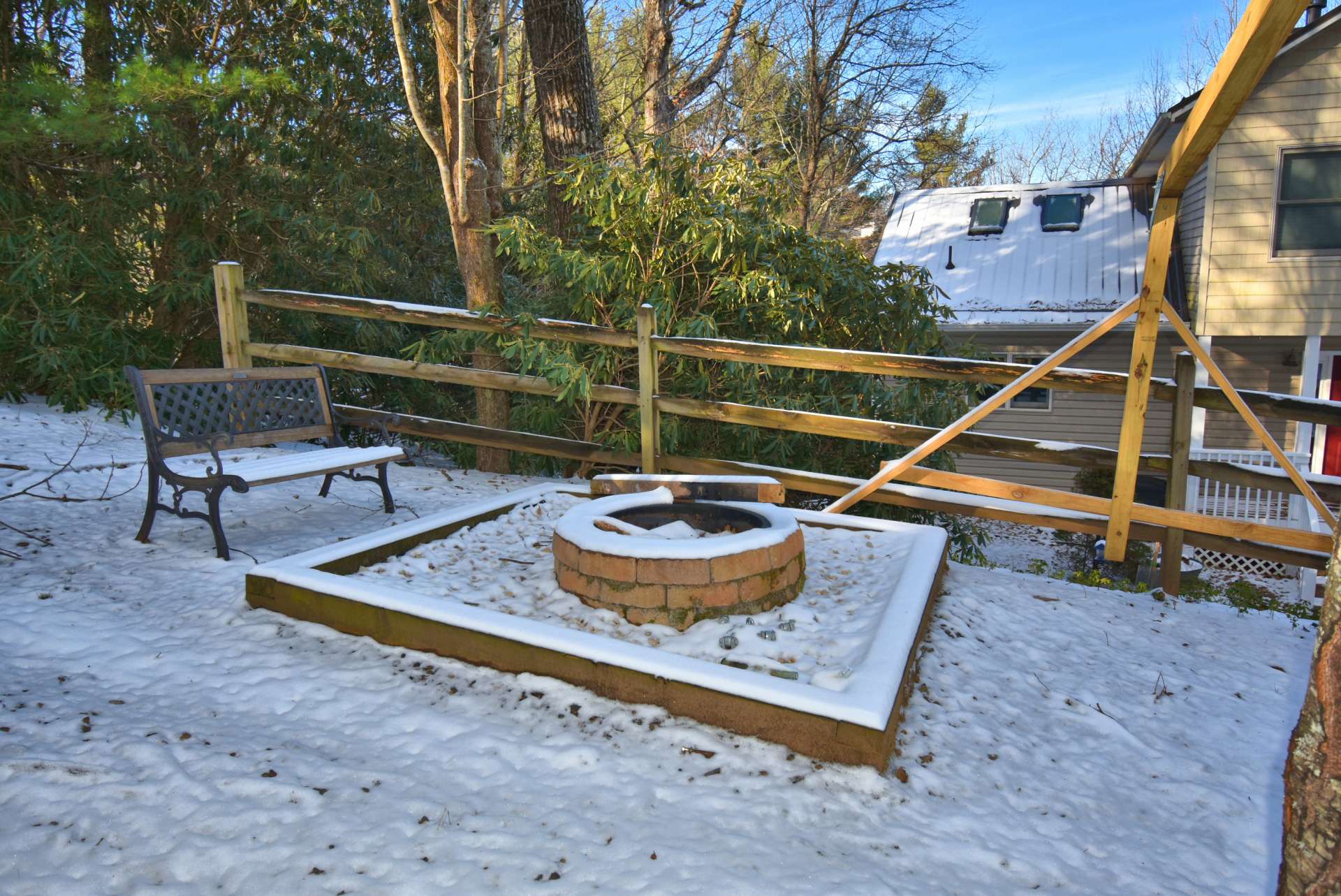 In addition to the main level deck and lower level deck,  this property features an outdoor firepit area, perfect for gathering around to share stories from long  ago while making smores and precious memories.