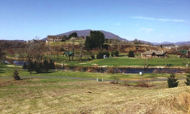 If you are looking for a NC Mountain homesite in a gated community, come take a look at this 1.30 acre lot in the highly sought after community of Village on the New.