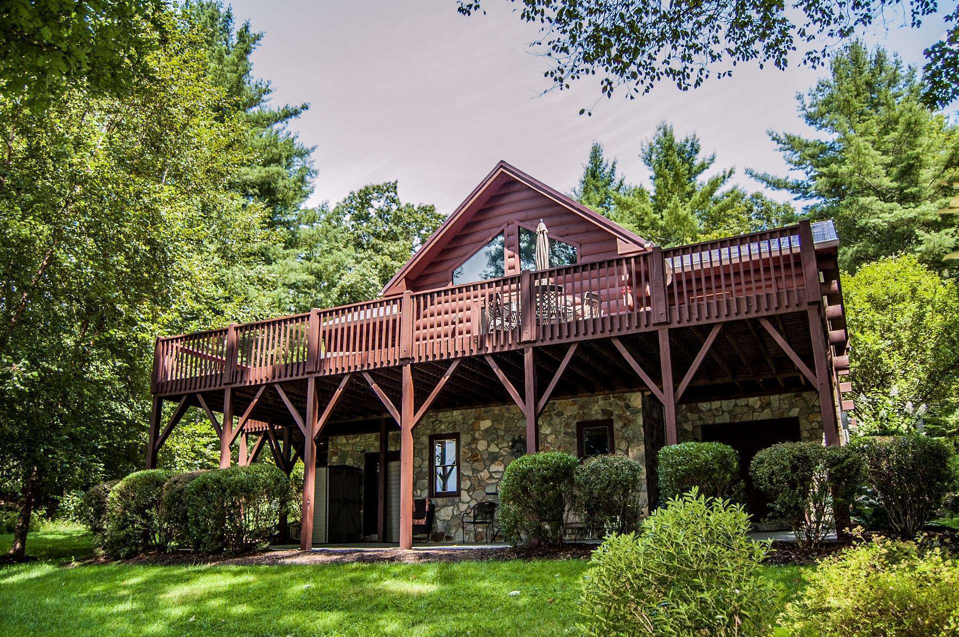 Offered at $329,000, this adorable 3-bedroom, 3-bath log cabin nestled in a beautiful 1.5 acre setting in Canawhay, a gated community offering common New River Access and a lake for all of your fishing, kayaking and tubing pleasure, is the ideal North Carolina Mountain retreat or primary residence. W112