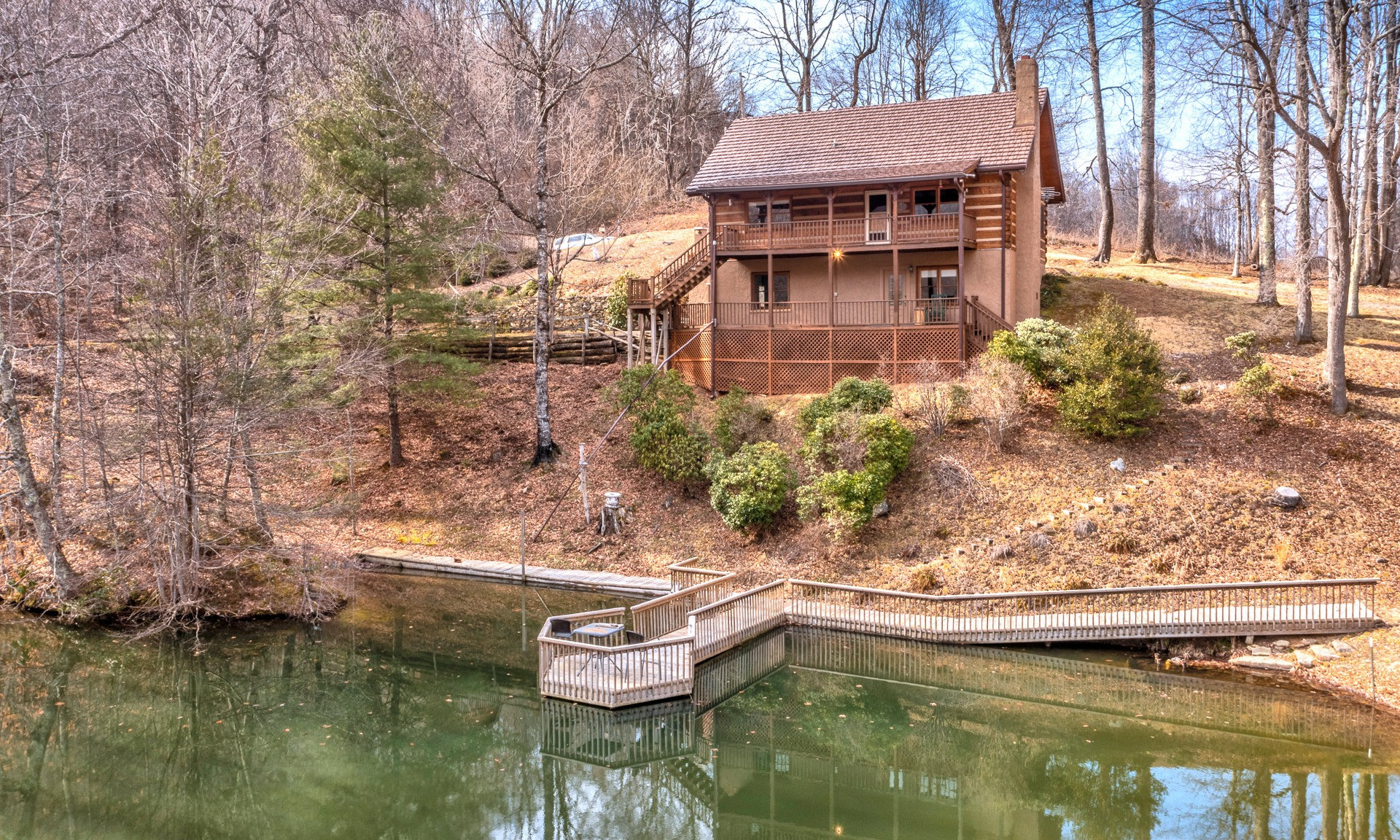 Hidden away in a private 3 acre setting in the Elk Park area of Avery County, this sweet log cabin is the ideal NC Mountain retreat.