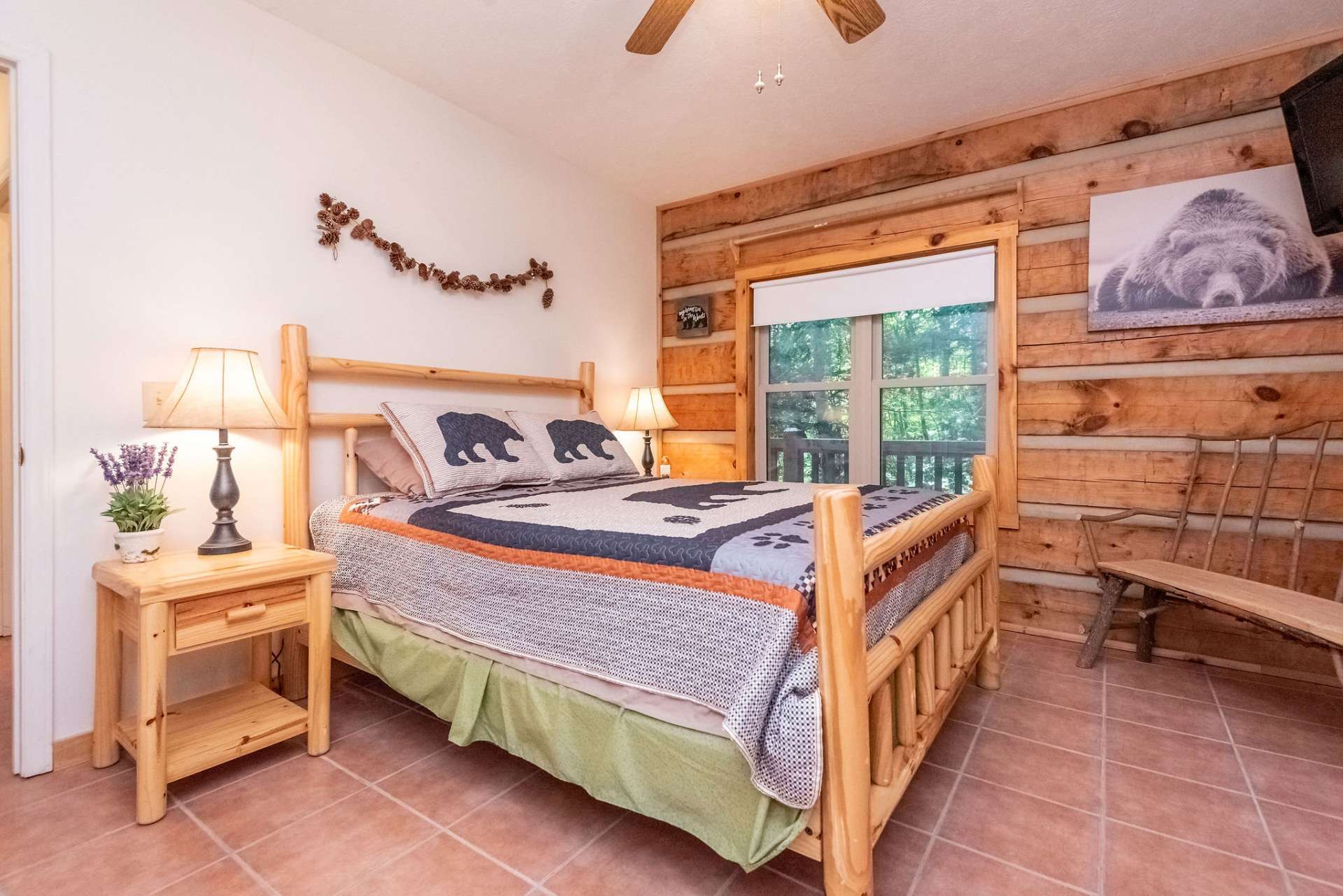 1 of 2 main level bedrooms with plenty of space to spread and out relax after a day of hiking, kayaking, exploring, or shopping.