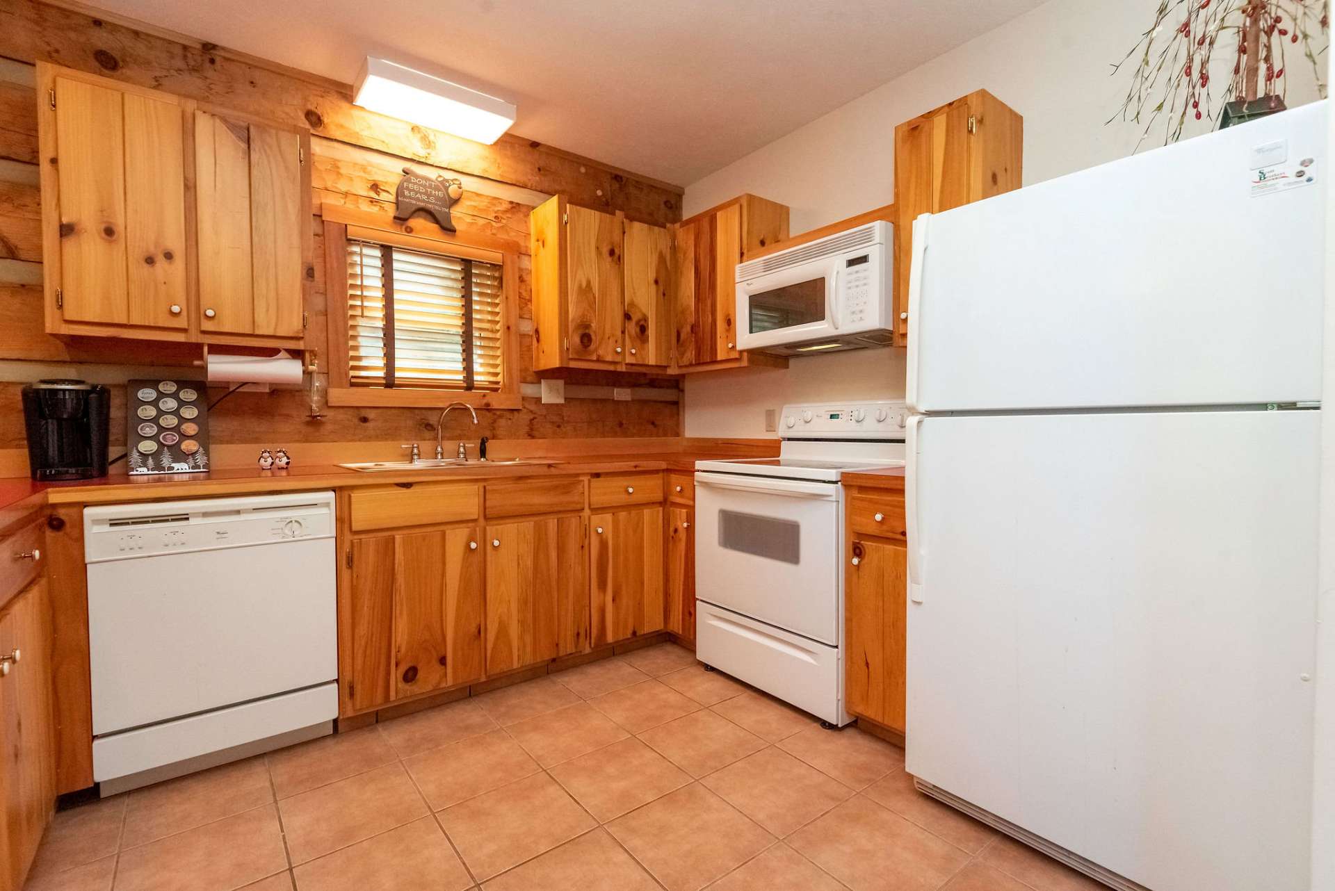 This kitchen gives you plenty of cabinet space and counter area for your culinary delights.