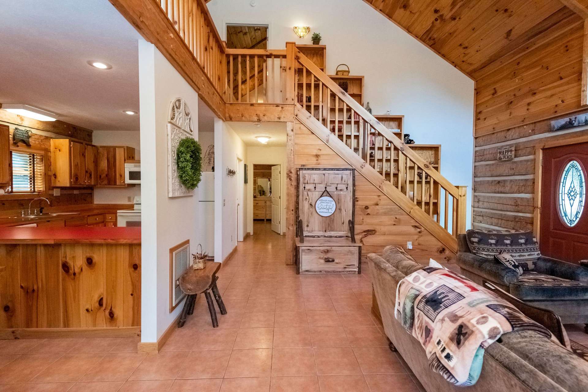 The white walls compliment all the warm colors of the wood accents and flooring.